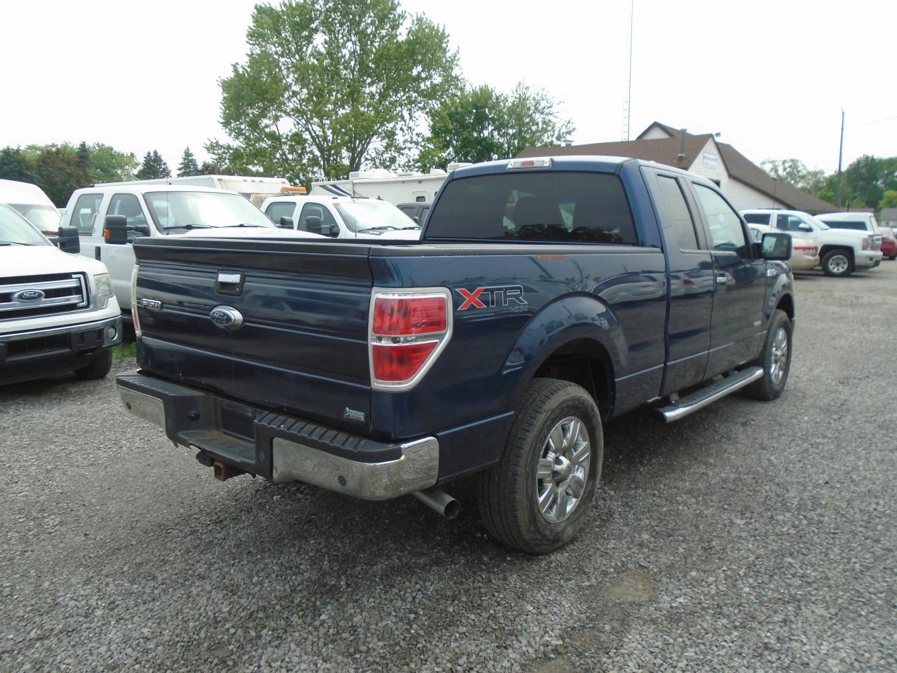 2013 Ford F-150 4WD SuperCab 145  Lariat - Photo #4
