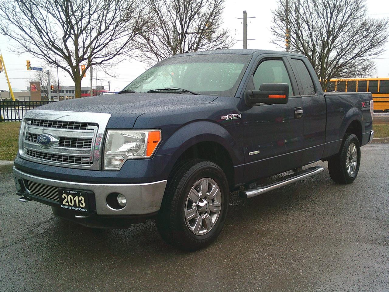 2013 Ford F-150 4WD SuperCab XLT Lariat Photo