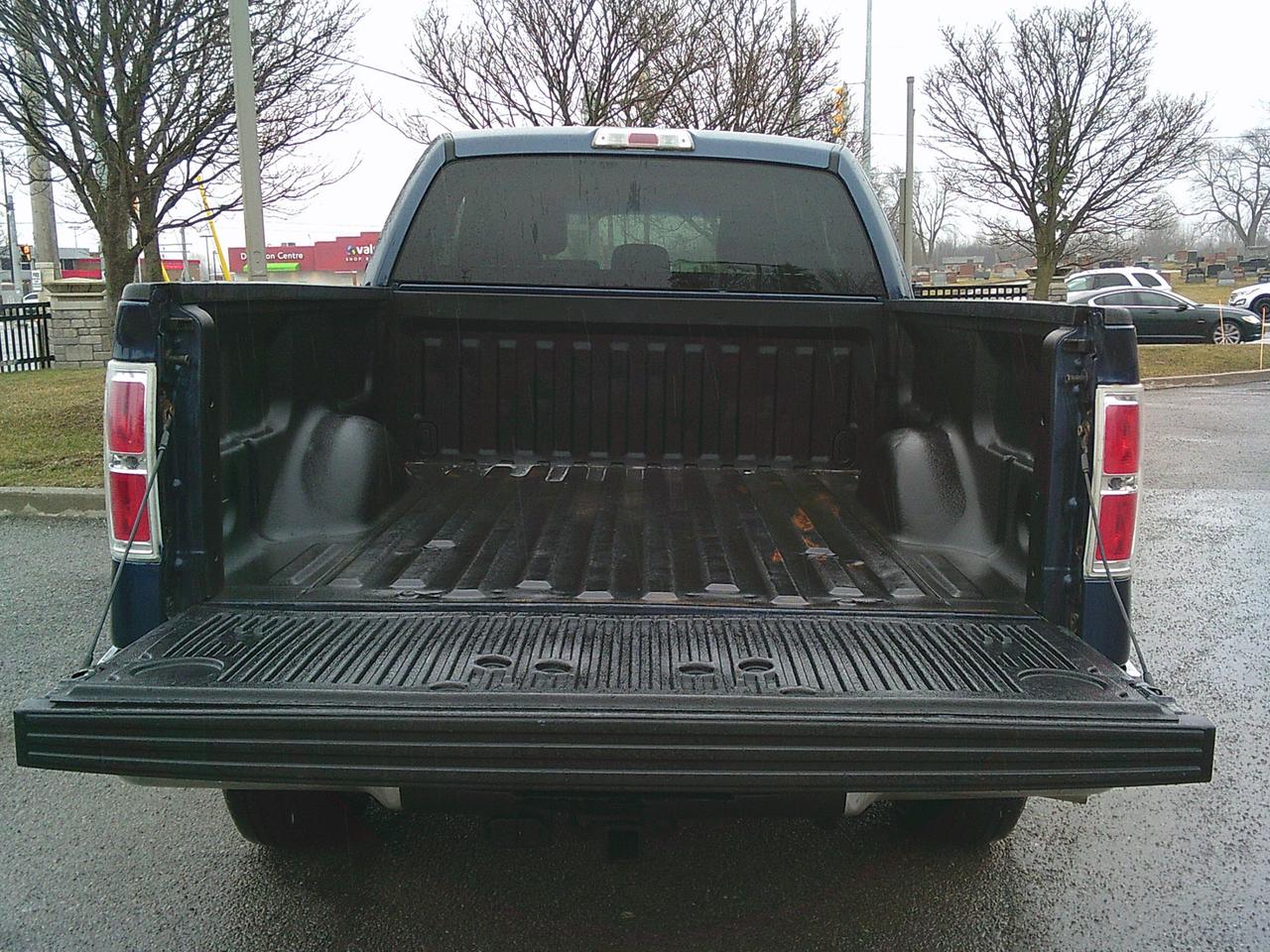 2013 Ford F-150 4WD SuperCab XLT Lariat Photo