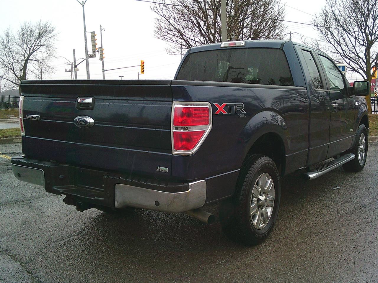 2013 Ford F-150 4WD SuperCab XLT Lariat Photo