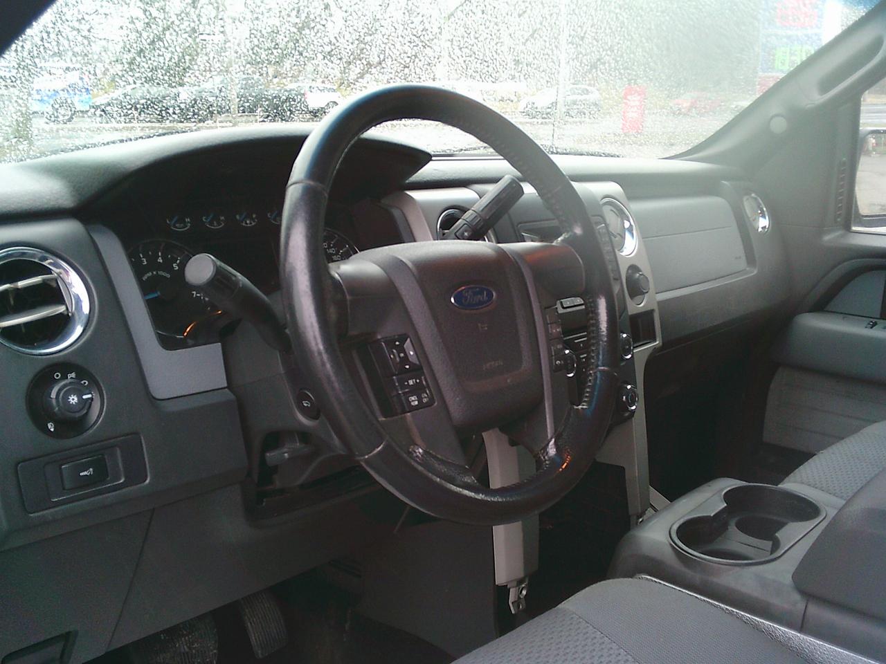 2013 Ford F-150 4WD SuperCab XLT Lariat Photo