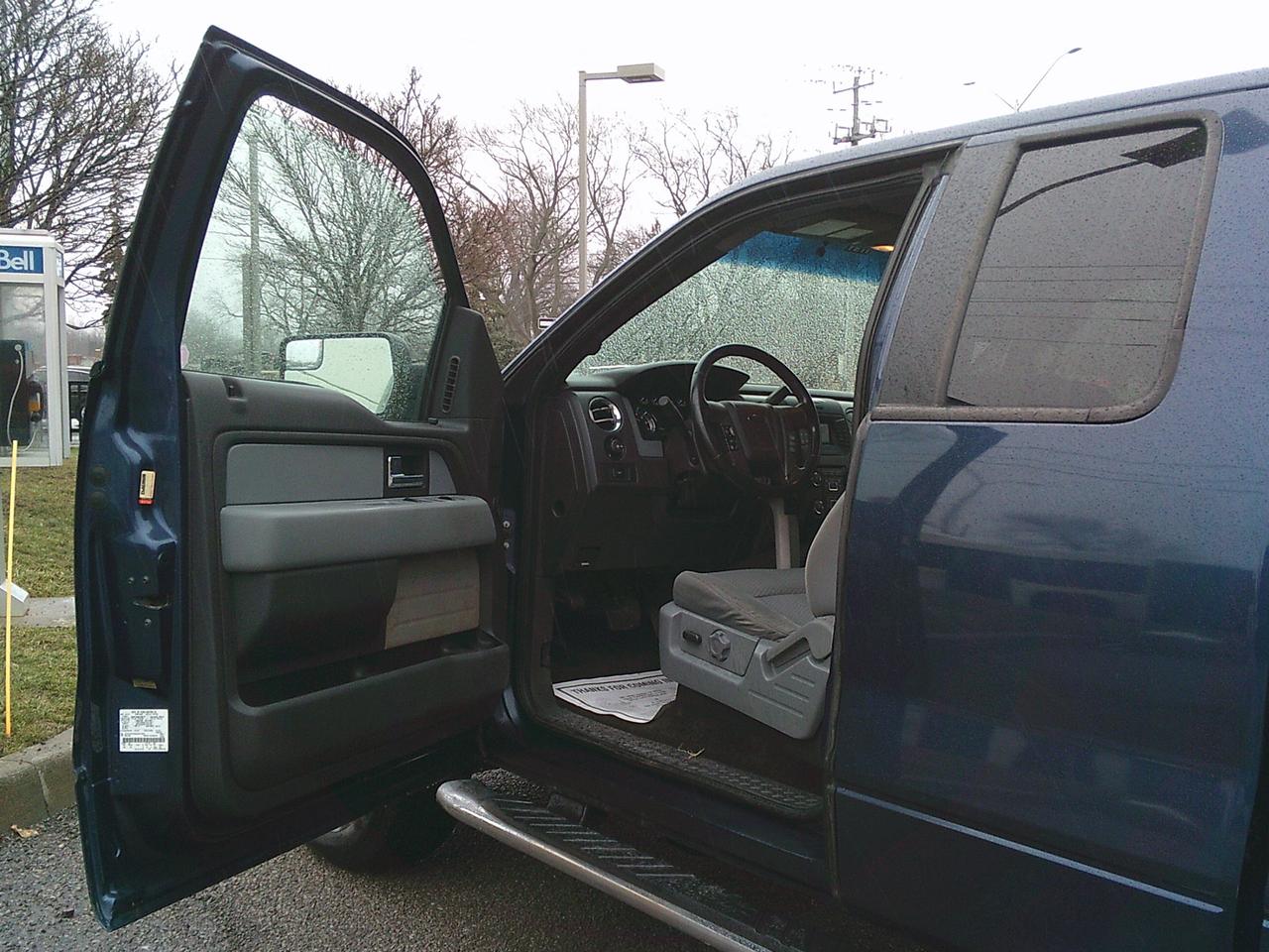 2013 Ford F-150 4WD SuperCab XLT Lariat Photo