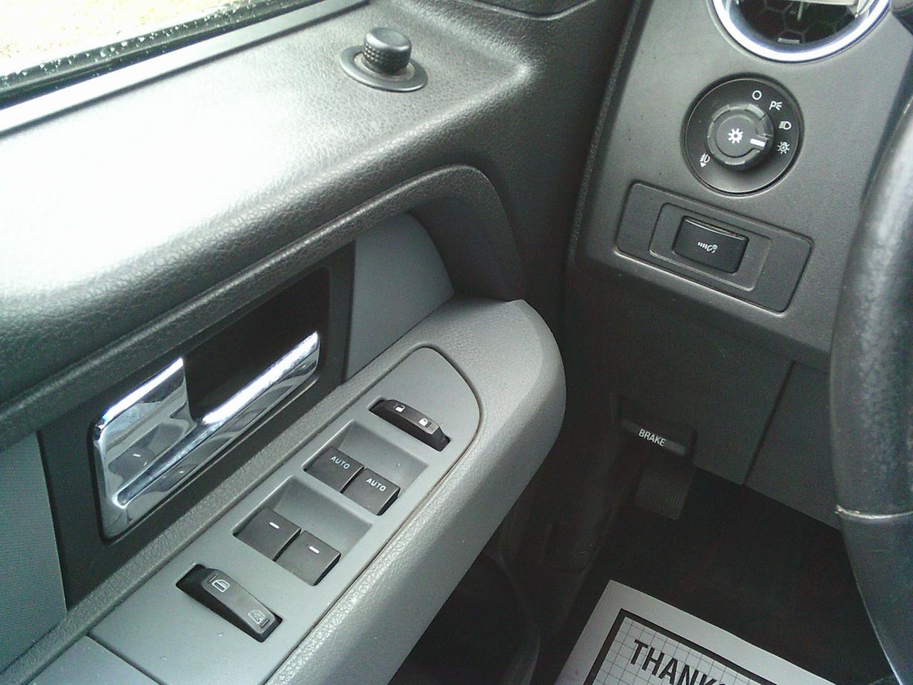 2013 Ford F-150 4WD SuperCab XLT Lariat Photo