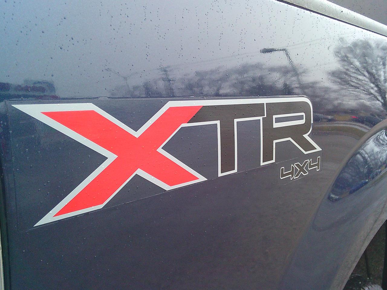 2013 Ford F-150 4WD SuperCab XLT Lariat Photo