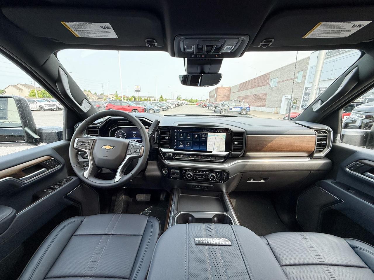 2025 Chevrolet Silverado 2500 HD High Country 6.6L DURAMAX WITH REMOTE START/ENTRY, SUNROOF, HEATED SEATS, HEATED STEERING WHEEL, VENTILATED SEATS, BOSE SOUND SYSTEM, POWER UP/DOWN TAILGATE Photo