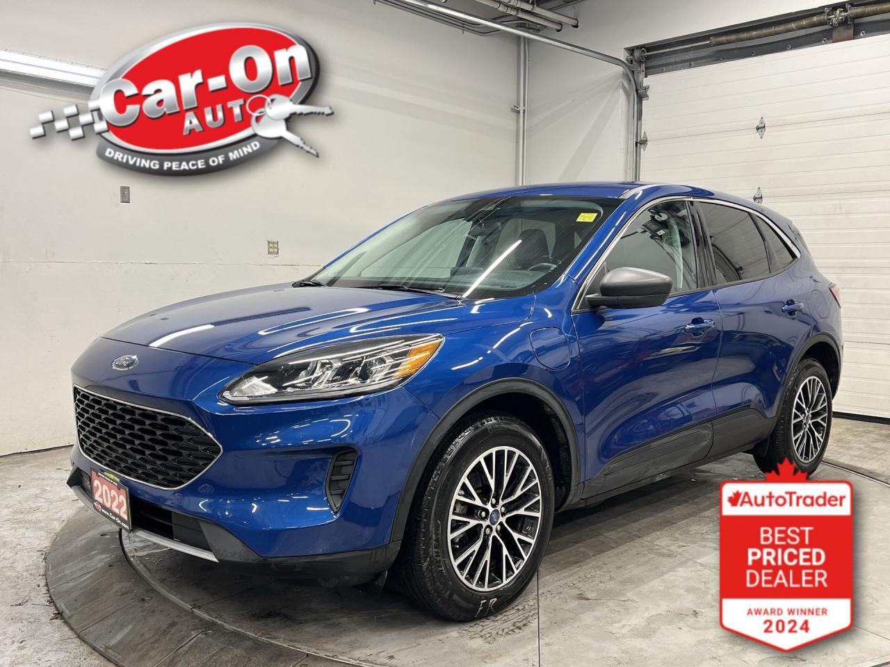 ONLY 38,000KMS!! PLUG-IN HYBRID!! SE W/ Heated seats & steering, 8-inch touchscreen w/ Android Auto/ Apple CarPlay, remote start, blind spot monitor, rear cross-traffic alert, pre-collision assist, lane keep assist, backup camera, 18-inch alloys, dual-zone climate control, automatic headlights w/ auto highbeams, keyless entry w/ push start, power mirrors, power windows, power locks, leather-wrapped steering wheel, cruise control, Bluetooth and more!! This vehicle just landed and is awaiting a full detail and photo shoot. Contact us and book your road test today!