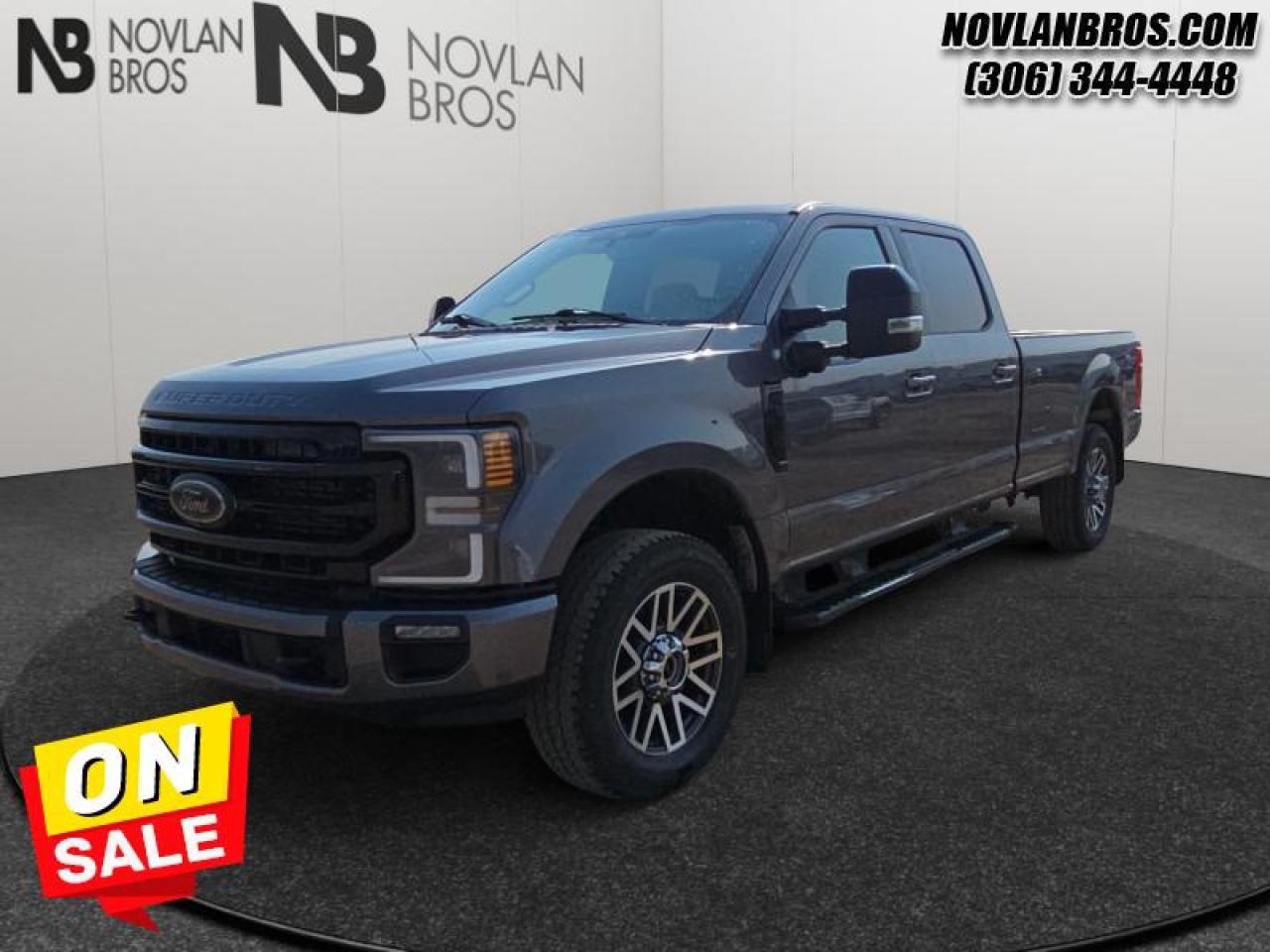 <b>Power Stroke, Navigation, Sunroof, Heated Seats, Reverse Sense System!</b><br> <br> Check out our great inventory of pre-owned vehicles at Novlan Brothers!<br> <br> Hot Deal! Weve marked this unit down $2000 from its regular price of $59800.   Brutish power and payload capacity are key traits of this Ford F-350, while aluminum construction brings it into the 21st century. This  2022 Ford F-350 Super Duty is for sale today in Paradise Hill. <br> <br>The most capable truck for work or play, this heavy-duty Ford F-350 never stops moving forward and gives you the power you need, the features you want, and the style you crave! With high-strength, military-grade aluminum construction, this F-350 Super Duty cuts the weight without sacrificing toughness. The interior design is first class, with simple to read text, easy to push buttons and plenty of outward visibility. This truck is strong, extremely comfortable and ready for anything. This  sought after diesel Crew Cab 4X4 pickup  has 220,035 kms. Its  grey in colour  . It has a 10 speed automatic transmission and is powered by a  475HP 6.7L 8 Cylinder Engine.  <br> <br> Our F-350 Super Dutys trim level is Lariat. Stepping up to this premium Ford F-350 Lariat is an excellent decision as it comes loaded with unique aluminum wheels, heated and cooled leather seats, a premium Bang & Olufsen audio system with SiriusXM radio, chrome exterior accents with a built-in rear bumper step, a Class V trailer hitch and power extendable trailer style mirrors. It also includes a colour touchscreen with SYNC 4, Apple CarPlay and Android Auto, side running boards, power front seats, a digital dash, FordPass Connect 4G LTE with a smart device remote start, a power locking tailgate, Ford Co-Pilot360 with rear parking sensors, blind spot detection, a leather steering wheel, lane departure warning, automatic emergency braking, dual zone climate control, power adjustable pedals and so much more. This vehicle has been upgraded with the following features: Power Stroke, Navigation, Sunroof, Heated Seats, Reverse Sense System, Rear View Camera, Remote Engine Start. <br> To view the original window sticker for this vehicle view this <a href=http://www.windowsticker.forddirect.com/windowsticker.pdf?vin=1FT8W3BT5NEF92418 target=_blank>http://www.windowsticker.forddirect.com/windowsticker.pdf?vin=1FT8W3BT5NEF92418</a>. <br/><br> <br>To apply right now for financing use this link : <a href=http://novlanbros.com/credit/ target=_blank>http://novlanbros.com/credit/</a><br><br> <br/><br>The Novlan family is owned and operated by a third generation and committed to the values inherent from our humble beginnings.<br> Come by and check out our fleet of 30+ used cars and trucks and 120+ new cars and trucks for sale in Paradise Hill.  o~o