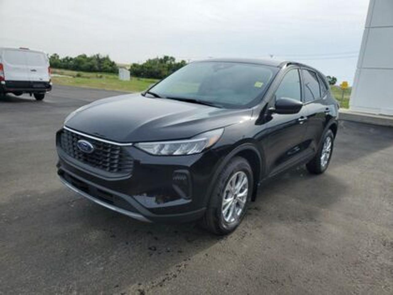 This all-new 2025 Escape Active 200A looks absolutely stunning in Agate Black Metallic. This 5-passenger All-wheel drive crossover comes equipped with the 1.5L EcoBoost® engine. This remarkable engine not only produces 181 horsepower and 190 ft-lbs of torque, but by leveraging EcoBoost® technology and an 8-speed automatic transmission, this crossover is rated to get an estimated 8.4L/100km (34 miles per gallon) combined highway/city fuel economy.

Key Features:
8 Instrument panel cluster
 All-wheel drive
Ford Co-Pilot360
Heated Front Seats
Remote Start
Heated Mirrors
SYNC® 4 W/8 LCD Capacitive Touchscreen
Wireless Apple CarPlay® and Android Auto Compatibility
Privacy Glass
17 Shadow Silver Painted Aluminum Wheels
Power Windows
LED Taillamps
LED Headlamps
FordPass Connect
Engine Block Heater
Mini Spare Wheel/Tire

Moose Jaw Ford, conveniently located at 1010 North Service Road in Moose Jaw, is your trusted destination for all your automotive needs. With an impressive 4.8-star Google rating from nearly 1,500 reviews, we are proud to deliver an exceptional vehicle-buying experience tailored just for you. Our Moose Jaw Motives set us apart, offering unbeatable value like half-priced oil changes for life on pre-owned vehicles, one year of key and remote protection, and one year of tire and rim protection. Enjoy peace of mind with every purchase. At Moose Jaw Ford, were committed to driving positive change in our community by combining exceptional service, high-quality vehicles, and a guest-first approach. Visit us today!