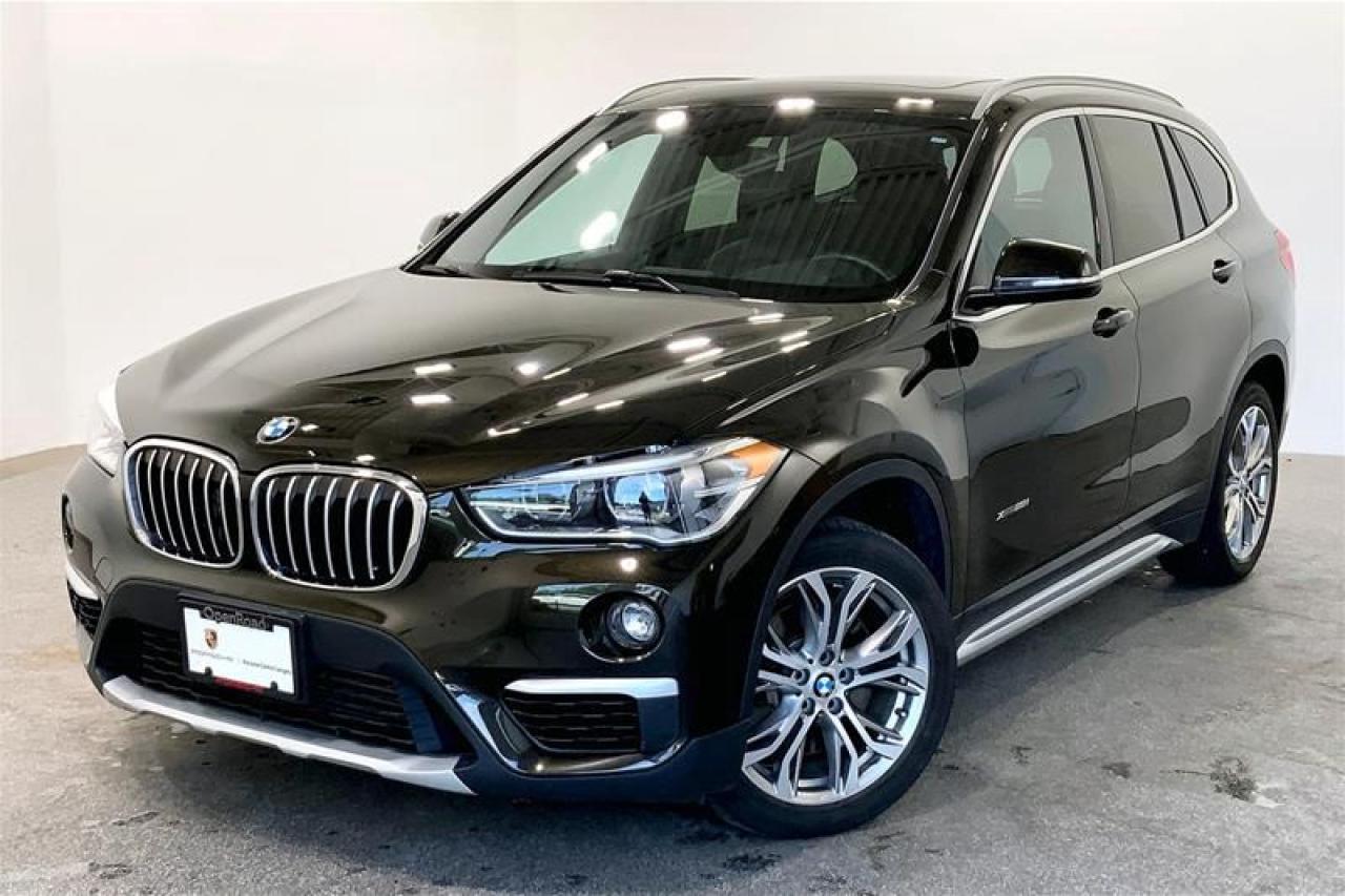 This Vehicle is Highly Equipped with Premium Package Enhanced, On-Board Navigation, Heated Steering Wheel, Head-Up Display, Comfort Access, Panorama Sunroof, Performance Control, Emergency Braking Preparation, Emergency Braking Assist and much more! 2017 BMW X1 xDrive28i comes in Sparkling Storm Metallic with a Black Leatherette Interior! This is a Local BC Vehicle with One Previous Owner! We Accept All Trade-Ins and Buy-Ins!! For more details or to schedule a test drive with one of our highly trained sales executives please call or send a website enquiry now before it is gone. 604-530-8911. Porsche Center Langley has won the prestigious Porsche Premier Dealer Award eight years in a row. We are centrally located just a short distance from Highway 1 in beautiful Langley, British Columbia. Our hope is to have you driving your dream vehicle soon. Please note that additional fees, including a $599 documentation fee & a $690 dealer prep fee, apply to all pre-owned vehicles. Dealer #40136