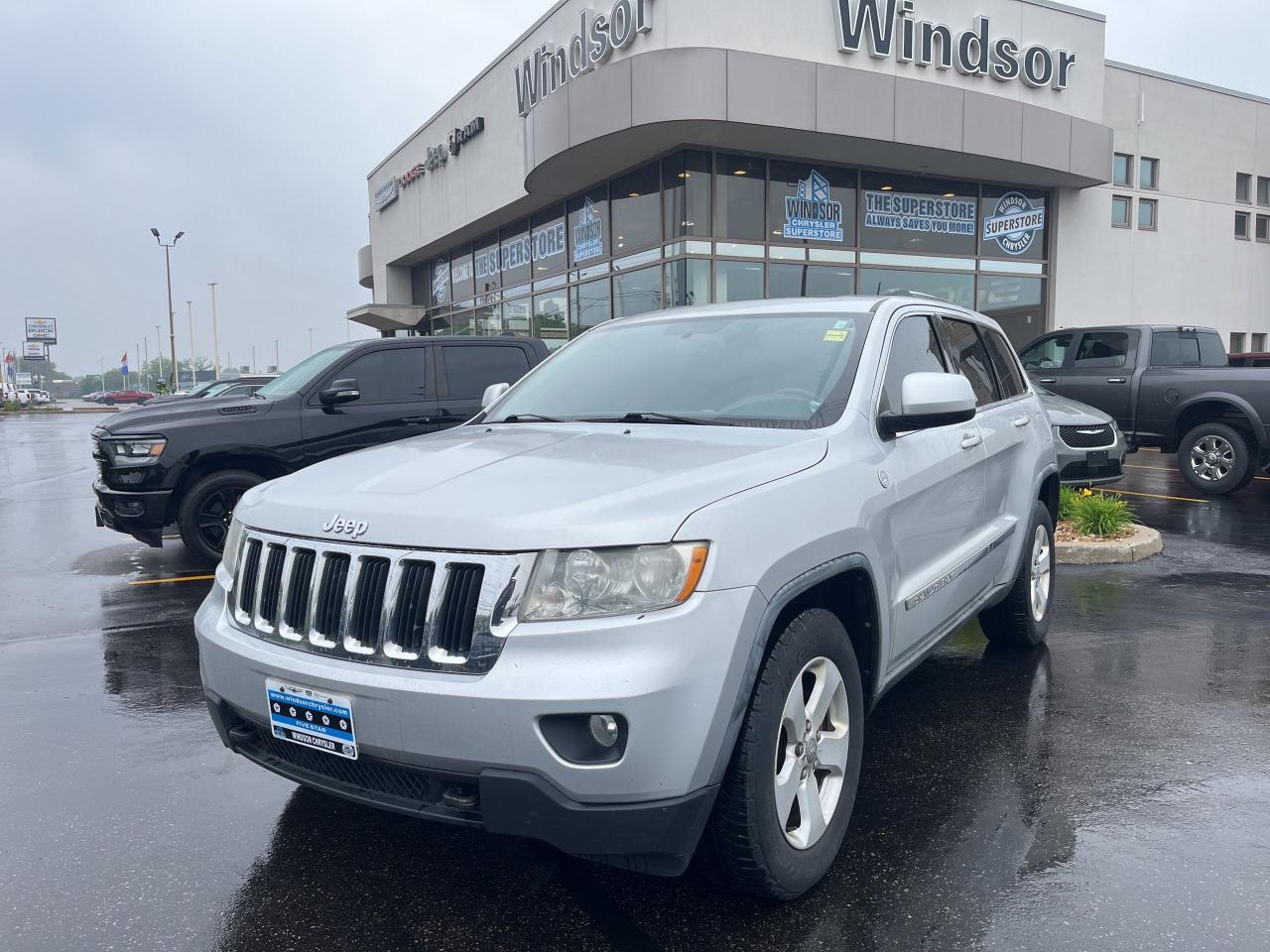Used 2011 Jeep Grand Cherokee AS IS /V8 / LAREDO / TRAILER TOW GROUP / HTD SEATS for sale in Windsor, ON