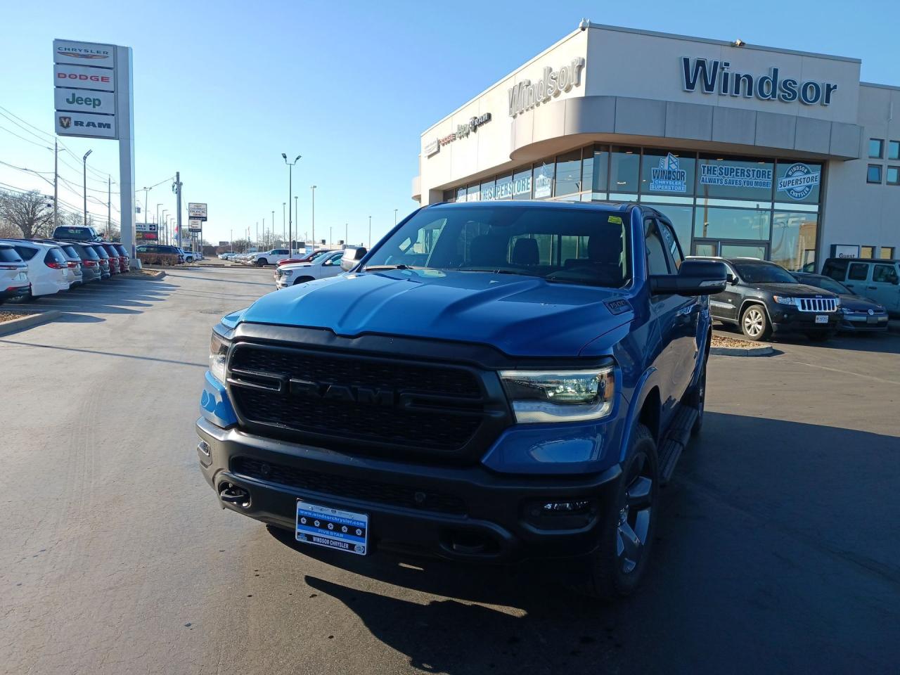 BUILT TO SERVE BIGHORN LEVEL B / NAV / RMT START / HEATED SEATS / ANDROID AUTO APPLE CAR PLAY / PARKING SENSORS F+R / CLASS IV HITCH / PREMIUM SPEAKERS / POWER REAR SLIDING WINDOW / E-LOCKER REAR AXLE / POWER ADJUSTABLE PEDALS / POWER SEAT / SKID PLATES

Honor commitment and conquer challenges with the striking 2024 RAM 1500 Big Horn Built to Serve Crew Cab 4x4, blending rugged capability with a distinctive tribute to service. This powerful truck offers ample space and unwavering performance for any mission.

Recent Arrival!

Night Edge Blue 2024 Ram 1500 Big Horn/Lone Star 4WD 8-Speed Automatic HEMI 5.7L V8 VVT

**CARPROOF CERTIFIED**.

* PLEASE SEE OUR MAIN WEBSITE FOR MORE PICTURES AND CARFAX REPORTS * Buy in confidence at WINDSOR CHRYSLER with our 95-point safety inspection by our certified technicians. Searching for your upgrade has never been easier. You will immediately get the low market price based on our market research, which means no more wasted time shopping around for the best price, Its time to drive home the most car for your money today. OVER 100 Pre-Owned Vehicles in Stock! Our Finance Team will secure the Best Interest Rate from one of out 20 Auto Financing Lenders that can get you APPROVED! Financing Available For All Credit Types! Whether you have Great Credit, No Credit, Slow Credit, Bad Credit, Been Bankrupt, On Disability, Or on a Pension, we have options. Looking to just sell your vehicle? We buy all makes and models let us buy your vehicle. Proudly Serving Windsor, Essex, Leamington, Kingsville, Belle River, LaSalle, Amherstburg, Tecumseh, Lakeshore, Strathroy, Stratford, Leamington, Tilbury, Essex, St. Thomas, Waterloo, Wallaceburg, St. Clair Beach, Puce, Riverside, London, Chatham, Kitchener, Guelph, Goderich, Brantford, St. Catherines, Milton, Mississauga, Toronto, Hamilton, Oakville, Barrie, Scarborough, and the GTA.