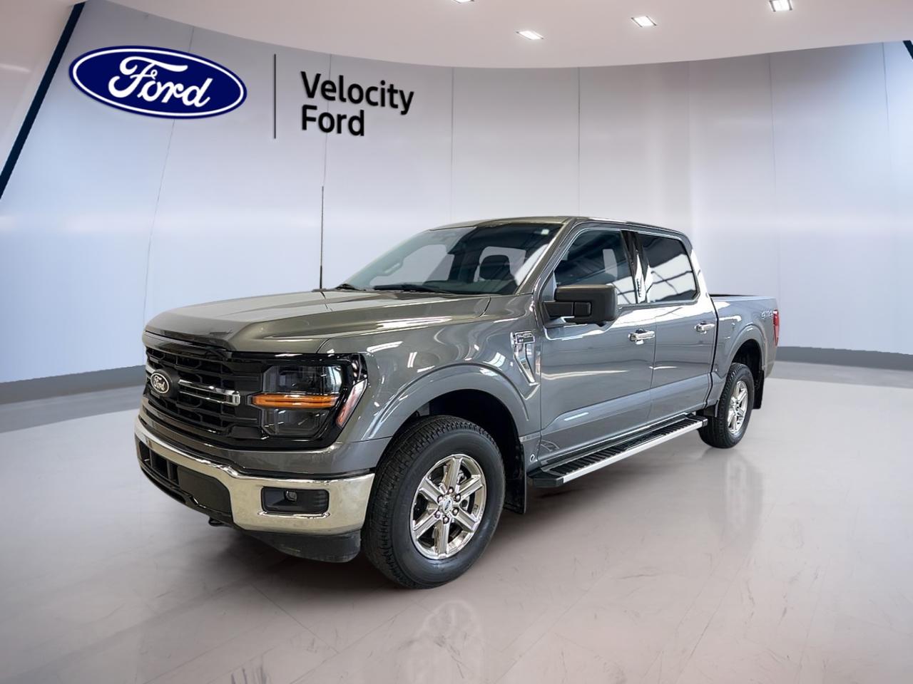 This 2024 Ford F-150 XLT, available at Velocity Ford in Moose Jaw, is a standout choice for drivers seeking power, versatility, and reliability. With only 32,746 km on the odometer, this used F-150 XLT features a striking grey exterior paired with a dark grey interior, offering a modern and rugged look. The 3.5L V6 EcoBoost engine delivers impressive performance, while the electronic 10-speed automatic transmission and four-wheel drive system ensure confident handling in all conditions.

TRUCK FEATURES  
»» 3.5L V6 EcoBoost engine for robust towing  
»» Four-wheel drive for enhanced off-road capability  
»» Durable bed for heavy-duty hauling tasks  
»» High ground clearance for rough terrain  

ADVANCED SAFETY FEATURES  
»» Backup camera for safer reversing  
»» Side impact airbags for added protection  
»» Electronic stability control for secure driving  
»» Traction control system for slippery roads  

PERFORMANCE AND EFFICIENCY  
»» 3.5L EcoBoost V6 for strong acceleration  
»» Electronic 10-speed automatic transmission  
»» Four-wheel drive for all-weather confidence  

COMFORT AND CONVENIENCE  
»» Spacious cabin with dark grey interior  
»» Easy-to-use controls for driver comfort  
»» Adjustable steering wheel for personalized fit  
»» Multiple storage compartments throughout cabin  

TECHNOLOGY AND CONNECTIVITY  
»» Bluetooth connectivity for hands-free calls  
»» Touchscreen interface for media and settings  
»» USB ports for device charging  
»» Integrated audio system for entertainment  

CARGO SPACE  
»» Large truck bed for versatile hauling  
»» Foldable rear seats for additional space  
»» Wide tailgate for easy loading  
»» Multiple tie-down points for securing cargo  

WHAT OTHER OWNERS LIKE  
»» Strong towing and payload capabilities  
»» Smooth and responsive EcoBoost engine  
»» Comfortable and quiet ride quality  
»» User-friendly technology features  

This 2024 Ford F-150 XLTs VIN is: 1FTFW3L80RKE60921.