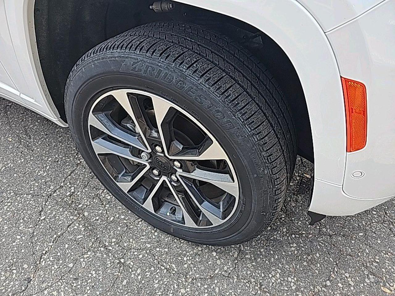 12594439