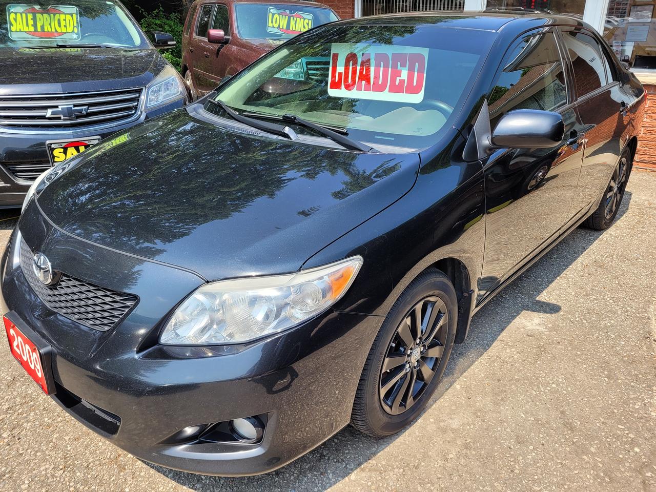 <p>Accident Free, Certified, Financing Available & Trade-ins Welcome!</p><p>MOTOMASTER SE3 Tires with MICHELIN X-ICE Snow Tires on Rims&nbsp;</p><p><span style=color: #001d35; font-family: Google Sans, Arial, sans-serif; font-size: 18px; background-color: #ffffff; data-huuid=7146468512899354896>The 2009 Toyota Corolla LE is a <mark class=QVRyCf style=background: none 0% 0% / auto repeat scroll padding-box border-box #d3e3fd; border-radius: 4px; padding: 0px 2px;>4-door sedan with an automatic transmission</mark>, available in the LE trim level.&nbsp;</span><span style=color: #001d35; font-family: Google Sans, Arial, sans-serif; font-size: 18px; background-color: #ffffff; data-huuid=7146468512899357641>Its known for its fuel efficiency, reliability, and comfortable ride.&nbsp;</span><span style=color: #001d35; font-family: Google Sans, Arial, sans-serif; font-size: 18px; background-color: #ffffff; data-huuid=7146468512899356290>The LE trim adds features like alloy wheels, cruise control, and a 6-speaker audio system.<span class=pjBG2e data-cid=679e1148-ba11-4ef3-9d5d-389736fd3bff><span class=UV3uM style=text-wrap-mode: nowrap;>&nbsp;</span></span></span></p><div class=WaaZC style=color: #001d35; font-family: Google Sans, Arial, sans-serif; font-size: 18px; background-color: #ffffff;><div class=RJPOee EIJn2 style=animation: auto ease 0s 1 normal none running none !important;><div class=rPeykc pyPiTc style=margin: 20px 0px 10px; letter-spacing: 0px; line-height: 26px; data-hveid=CA0QAQ data-ved=2ahUKEwjwuPqPyNONAxXNjokEHWinLMAQo_EKegQIDRAB><span data-huuid=13403324593096182177>Key Features:</span></div></div></div><div class=WaaZC style=color: #001d35; font-family: Google Sans, Arial, sans-serif; font-size: 18px; background-color: #ffffff;><div class=RJPOee EIJn2 style=animation: auto ease 0s 1 normal none running none !important;><ul style=margin: 10px 0px 20px; padding: 0px 0px 0px 24px; font-size: 16px; line-height: 22px; data-hveid=CDsQAQ data-ved=2ahUKEwjwuPqPyNONAxXNjokEHWinLMAQm_YKegQIOxAB><li style=margin: 0px 0px 8px; padding: 0px 0px 0px 4px; list-style: inherit;><span data-huuid=13403324593096183390><strong>Engine:</strong>&nbsp;</span><span data-huuid=13403324593096182429><span data-huuid=13403324593096182429>The LE trim typically comes with a 1.8-liter four-cylinder engine.<span class=pjBG2e data-cid=21abe22f-fa10-4375-877b-f4162c14890a><span class=UV3uM style=text-wrap-mode: nowrap;>&nbsp;</span></span></span></span><div class=NPrrbc style=margin-right: 6px; display: inline-flex; data-cid=21abe22f-fa10-4375-877b-f4162c14890a data-uuids=13403324593096183390,13403324593096182429><div class=BMebGe btku5b fCrZyc LwdV0e FR7ZSc OJeuxf style=display: inline-block; vertical-align: middle; cursor: pointer; outline: 0px; -webkit-tap-highlight-color: transparent; color: #0b57d0; tabindex=0 role=button aria-label=View related links data-hveid=CCAQAQ data-ved=2ahUKEwjwuPqPyNONAxXNjokEHWinLMAQ3fYKegQIIBAB><div class=niO4u style=display: flex; -webkit-box-pack: center; justify-content: center; position: relative; -webkit-box-align: stretch; align-items: stretch; width: 28px; background-color: transparent; border-radius: 9999px; margin: 0px auto; outline: transparent solid 1px; outline-offset: -1px; height: 20px; min-height: 20px;><div class=kHtcsd style=display: flex; -webkit-box-align: center; align-items: center; -webkit-box-pack: center; justify-content: center; width: 28px; border-radius: 9999px; height: 20px;>&nbsp;</div></div></div></div></li><li style=margin: 0px 0px 8px; padding: 0px 0px 0px 4px; list-style: inherit;><span data-huuid=13403324593096180507><strong>Transmission:</strong>&nbsp;</span><span data-huuid=13403324593096183642><span data-huuid=13403324593096183642>Automatic transmission.<span class=pjBG2e data-cid=0800a042-d103-423d-a52a-fb3b06e4ec29><span class=UV3uM style=text-wrap-mode: nowrap;>&nbsp;</span></span></span></span><div class=NPrrbc style=margin-right: 6px; display: inline-flex; data-cid=0800a042-d103-423d-a52a-fb3b06e4ec29 data-uuids=13403324593096180507,13403324593096183642><div class=BMebGe btku5b fCrZyc LwdV0e FR7ZSc OJeuxf style=display: inline-block; vertical-align: middle; cursor: pointer; outline: 0px; -webkit-tap-highlight-color: transparent; color: #0b57d0; tabindex=0 role=button aria-label=View related links data-hveid=CCYQAQ data-ved=2ahUKEwjwuPqPyNONAxXNjokEHWinLMAQ3fYKegQIJhAB><div class=niO4u style=display: flex; -webkit-box-pack: center; justify-content: center; position: relative; -webkit-box-align: stretch; align-items: stretch; width: 28px; background-color: transparent; border-radius: 9999px; margin: 0px auto; outline: transparent solid 1px; outline-offset: -1px; height: 20px; min-height: 20px;><div class=kHtcsd style=display: flex; -webkit-box-align: center; align-items: center; -webkit-box-pack: center; justify-content: center; width: 28px; border-radius: 9999px; height: 20px;>&nbsp;</div></div></div></div></li><li style=margin: 0px 0px 8px; padding: 0px 0px 0px 4px; list-style: inherit;><span data-huuid=13403324593096181720><strong>Drivetrain:</strong>&nbsp;</span><span data-huuid=13403324593096180759><span data-huuid=13403324593096180759>Front-wheel drive.<span class=pjBG2e data-cid=79400ed3-f412-44c7-bcd8-97beb1bc7ea8><span class=UV3uM style=text-wrap-mode: nowrap;>&nbsp;</span></span></span></span><div class=NPrrbc style=margin-right: 6px; display: inline-flex; data-cid=79400ed3-f412-44c7-bcd8-97beb1bc7ea8 data-uuids=13403324593096181720,13403324593096180759><div class=BMebGe btku5b fCrZyc LwdV0e FR7ZSc OJeuxf style=display: inline-block; vertical-align: middle; cursor: pointer; outline: 0px; -webkit-tap-highlight-color: transparent; color: #0b57d0; tabindex=0 role=button aria-label=View related links data-hveid=CCMQAQ data-ved=2ahUKEwjwuPqPyNONAxXNjokEHWinLMAQ3fYKegQIIxAB><div class=niO4u style=display: flex; -webkit-box-pack: center; justify-content: center; position: relative; -webkit-box-align: stretch; align-items: stretch; width: 28px; background-color: transparent; border-radius: 9999px; margin: 0px auto; outline: transparent solid 1px; outline-offset: -1px; height: 20px; min-height: 20px;><div class=kHtcsd style=display: flex; -webkit-box-align: center; align-items: center; -webkit-box-pack: center; justify-content: center; width: 28px; border-radius: 9999px; height: 20px;>&nbsp;</div></div></div></div></li><li style=margin: 0px 0px 8px; padding: 0px 0px 0px 4px; list-style: inherit;><span data-huuid=13403324593096182933><strong>Fuel Economy:</strong>&nbsp;</span><span data-huuid=13403324593096181972><span data-huuid=13403324593096181972>27 city / 35 highway MPG.<span class=pjBG2e data-cid=310e110d-d58e-4589-bc90-01db64ae8039><span class=UV3uM style=text-wrap-mode: nowrap;>&nbsp;</span></span></span></span><div class=NPrrbc style=margin-right: 6px; display: inline-flex; data-cid=310e110d-d58e-4589-bc90-01db64ae8039 data-uuids=13403324593096182933,13403324593096181972><div class=BMebGe btku5b fCrZyc LwdV0e FR7ZSc OJeuxf style=display: inline-block; vertical-align: middle; cursor: pointer; outline: 0px; -webkit-tap-highlight-color: transparent; color: #0b57d0; tabindex=0 role=button aria-label=View related links data-hveid=CDMQAQ data-ved=2ahUKEwjwuPqPyNONAxXNjokEHWinLMAQ3fYKegQIMxAB><div class=niO4u style=display: flex; -webkit-box-pack: center; justify-content: center; position: relative; -webkit-box-align: stretch; align-items: stretch; width: 28px; background-color: transparent; border-radius: 9999px; margin: 0px auto; outline: transparent solid 1px; outline-offset: -1px; height: 20px; min-height: 20px;><div class=kHtcsd style=display: flex; -webkit-box-align: center; align-items: center; -webkit-box-pack: center; justify-content: center; width: 28px; border-radius: 9999px; height: 20px;>&nbsp;</div></div></div></div></li><li style=margin: 0px 0px 8px; padding: 0px 0px 0px 4px; list-style: inherit;><span data-huuid=13403324593096180050><strong>Features:</strong>&nbsp;</span><span data-huuid=13403324593096183185><span data-huuid=13403324593096183185>Alloy wheels, cruise control, 6-speaker audio system, and more.<span class=pjBG2e data-cid=22d443e8-e52b-4a5e-939a-c9cfcb1bec43><span class=UV3uM style=text-wrap-mode: nowrap;>&nbsp;</span></span></span></span><div class=NPrrbc style=margin-right: 6px; display: inline-flex; data-cid=22d443e8-e52b-4a5e-939a-c9cfcb1bec43 data-uuids=13403324593096180050,13403324593096183185><div class=BMebGe btku5b fCrZyc LwdV0e FR7ZSc OJeuxf style=display: inline-block; vertical-align: middle; cursor: pointer; outline: 0px; -webkit-tap-highlight-color: transparent; color: #0b57d0; tabindex=0 role=button aria-label=View related links data-hveid=CDYQAQ data-ved=2ahUKEwjwuPqPyNONAxXNjokEHWinLMAQ3fYKegQINhAB><div class=niO4u style=display: flex; -webkit-box-pack: center; justify-content: center; position: relative; -webkit-box-align: stretch; align-items: stretch; width: 28px; background-color: transparent; border-radius: 9999px; margin: 0px auto; outline: transparent solid 1px; outline-offset: -1px; height: 20px; min-height: 20px;><div class=kHtcsd style=display: flex; -webkit-box-align: center; align-items: center; -webkit-box-pack: center; justify-content: center; width: 28px; border-radius: 9999px; height: 20px;>&nbsp;</div></div></div></div></li><li style=margin: 0px 0px 8px; padding: 0px 0px 0px 4px; list-style: inherit;><span data-huuid=13403324593096181263><strong>Reliability:</strong>&nbsp;</span><span data-huuid=13403324593096180302><span data-huuid=13403324593096180302>Toyota Corollas are known for their reliability.<span class=pjBG2e data-cid=3aa4ce58-7b93-46be-b3aa-49cb16956065><span class=UV3uM style=text-wrap-mode: nowrap;>&nbsp;</span></span></span></span><div class=NPrrbc style=margin-right: 6px; display: inline-flex; data-cid=3aa4ce58-7b93-46be-b3aa-49cb16956065 data-uuids=13403324593096181263,13403324593096180302><div class=BMebGe btku5b fCrZyc LwdV0e FR7ZSc OJeuxf style=display: inline-block; vertical-align: middle; cursor: pointer; outline: 0px; -webkit-tap-highlight-color: transparent; color: #0b57d0; tabindex=0 role=button aria-label=View related links data-hveid=CDkQAQ data-ved=2ahUKEwjwuPqPyNONAxXNjokEHWinLMAQ3fYKegQIORAB><div class=niO4u style=display: flex; -webkit-box-pack: center; justify-content: center; position: relative; -webkit-box-align: stretch; align-items: stretch; width: 28px; background-color: transparent; border-radius: 9999px; margin: 0px auto; outline: transparent solid 1px; outline-offset: -1px; height: 20px; min-height: 20px;><div class=kHtcsd style=display: flex; -webkit-box-align: center; align-items: center; -webkit-box-pack: center; justify-content: center; width: 28px; border-radius: 9999px; height: 20px;>&nbsp;</div></div></div></div></li><li style=margin: 0px 0px 8px; padding: 0px 0px 0px 4px; list-style: inherit;><span data-huuid=13403324593096182476><strong>Ride Comfort:</strong>&nbsp;</span><span data-huuid=13403324593096181515><span data-huuid=13403324593096181515>The suspension delivers a comfortable and controlled ride.<span class=pjBG2e data-cid=32a53911-b199-403e-b8ff-ab6491a49ed7><span class=UV3uM style=text-wrap-mode: nowrap;>&nbsp;</span></span></span></span><div class=NPrrbc style=margin-right: 6px; display: inline-flex; data-cid=32a53911-b199-403e-b8ff-ab6491a49ed7 data-uuids=13403324593096182476,13403324593096181515><div class=BMebGe btku5b fCrZyc LwdV0e FR7ZSc OJeuxf style=display: inline-block; vertical-align: middle; cursor: pointer; outline: 0px; -webkit-tap-highlight-color: transparent; color: #0b57d0; tabindex=0 role=button aria-label=View related links data-hveid=CCEQAQ data-ved=2ahUKEwjwuPqPyNONAxXNjokEHWinLMAQ3fYKegQIIRAB><div class=niO4u style=display: flex; -webkit-box-pack: center; justify-content: center; position: relative; -webkit-box-align: stretch; align-items: stretch; width: 28px; background-color: transparent; border-radius: 9999px; margin: 0px auto; outline: transparent solid 1px; outline-offset: -1px; height: 20px; min-height: 20px;><div class=kHtcsd style=display: flex; -webkit-box-align: center; align-items: center; -webkit-box-pack: center; justify-content: center; width: 28px; border-radius: 9999px; height: 20px;>&nbsp;</div></div></div></div></li><li style=margin: 0px 0px 8px; padding: 0px 0px 0px 4px; list-style: inherit;><span data-huuid=13403324593096183689><strong>Spaciousness:</strong>&nbsp;</span><span data-huuid=13403324593096182728><span data-huuid=13403324593096182728>While not the most spacious car, it offers decent passenger and cargo space.<span class=pjBG2e data-cid=c58981ea-1738-45a5-b899-223b68f05778><span class=UV3uM style=text-wrap-mode: nowrap;>&nbsp;</span></span></span></span><div class=NPrrbc style=margin-right: 6px; display: inline-flex; data-cid=c58981ea-1738-45a5-b899-223b68f05778 data-uuids=13403324593096183689,13403324593096182728><div class=BMebGe btku5b fCrZyc LwdV0e FR7ZSc OJeuxf style=display: inline-block; vertical-align: middle; cursor: pointer; outline: 0px; -webkit-tap-highlight-color: transparent; color: #0b57d0; tabindex=0 role=button aria-label=View related links data-hveid=CCUQAQ data-ved=2ahUKEwjwuPqPyNONAxXNjokEHWinLMAQ3fYKegQIJRAB><div class=niO4u style=display: flex; -webkit-box-pack: center; justify-content: center; position: relative; -webkit-box-align: stretch; align-items: stretch; width: 28px; background-color: transparent; border-radius: 9999px; margin: 0px auto; outline: transparent solid 1px; outline-offset: -1px; height: 20px; min-height: 20px;><div class=kHtcsd style=display: flex; -webkit-box-align: center; align-items: center; -webkit-box-pack: center; justify-content: center; width: 28px; border-radius: 9999px; height: 20px;>&nbsp;</div></div></div></div></li><li style=margin: 0px 0px 8px; padding: 0px 0px 0px 4px; list-style: inherit;><span data-huuid=13403324593096180806><strong>Fuel Affordability:</strong>&nbsp;</span><span data-huuid=13403324593096179845><span data-huuid=13403324593096179845>Its generally considered a fuel-efficient car.<span class=pjBG2e data-cid=bfabee1c-38b7-4ff5-b0b9-d65116069929><span class=UV3uM style=text-wrap-mode: nowrap;>&nbsp;</span></span></span></span><div class=NPrrbc style=margin-right: 6px; display: inline-flex; data-cid=bfabee1c-38b7-4ff5-b0b9-d65116069929 data-uuids=13403324593096180806,13403324593096179845><div class=BMebGe btku5b fCrZyc LwdV0e FR7ZSc OJeuxf style=display: inline-block; vertical-align: middle; cursor: pointer; outline: 0px; -webkit-tap-highlight-color: transparent; color: #0b57d0; tabindex=0 role=button aria-label=View related links data-hveid=CCQQAQ data-ved=2ahUKEwjwuPqPyNONAxXNjokEHWinLMAQ3fYKegQIJBAB><div class=niO4u style=display: flex; -webkit-box-pack: center; justify-content: center; position: relative; -webkit-box-align: stretch; align-items: stretch; width: 28px; background-color: transparent; border-radius: 9999px; margin: 0px auto; outline: transparent solid 1px; outline-offset: -1px; height: 20px; min-height: 20px;><div class=kHtcsd style=display: flex; -webkit-box-align: center; align-items: center; -webkit-box-pack: center; justify-content: center; width: 28px; border-radius: 9999px; height: 20px;>&nbsp;</div></div></div></div></li><li style=margin: 0px 0px 8px; padding: 0px 0px 0px 4px; list-style: inherit;><span data-huuid=13403324593096182019><strong>Maintenance:</strong>&nbsp;</span><span data-huuid=13403324593096181058><span data-huuid=13403324593096181058>Known for affordable maintenance costs.<span class=pjBG2e data-cid=1414271d-64db-4ade-b5fd-25507a26c9db><span class=UV3uM style=text-wrap-mode: nowrap;>&nbsp;</span></span></span></span><div class=NPrrbc style=margin-right: 6px; display: inline-flex; data-cid=1414271d-64db-4ade-b5fd-25507a26c9db data-uuids=13403324593096182019,13403324593096181058><div class=BMebGe btku5b fCrZyc LwdV0e FR7ZSc OJeuxf style=display: inline-block; vertical-align: middle; cursor: pointer; outline: 0px; -webkit-tap-highlight-color: transparent; color: #0b57d0; tabindex=0 role=button aria-label=View related links data-hveid=CCcQAQ data-ved=2ahUKEwjwuPqPyNONAxXNjokEHWinLMAQ3fYKegQIJxAB><div class=niO4u style=display: flex; -webkit-box-pack: center; justify-content: center; position: relative; -webkit-box-align: stretch; align-items: stretch; width: 28px; background-color: transparent; border-radius: 9999px; margin: 0px auto; outline: transparent solid 1px; outline-offset: -1px; height: 20px; min-height: 20px;><div class=kHtcsd style=display: flex; -webkit-box-align: center; align-items: center; -webkit-box-pack: center; justify-content: center; width: 28px; border-radius: 9999px; height: 20px;>&nbsp;</div></div></div></div></li><li style=margin: 0px; padding: 0px 0px 0px 4px; list-style: inherit;><span data-huuid=13403324593096183232><strong>New for 2009:</strong>&nbsp;</span><span data-huuid=13403324593096182271>All-new redesigned model with a new rigid body structure, suspension system, electric power steering, and new exterior and interior styling.<span class=pjBG2e data-cid=8a31ec7e-6507-4863-8e17-e3ab6b63a89f><span class=UV3uM style=text-wrap-mode: nowrap;>&nbsp;</span></span></span></li></ul></div></div>