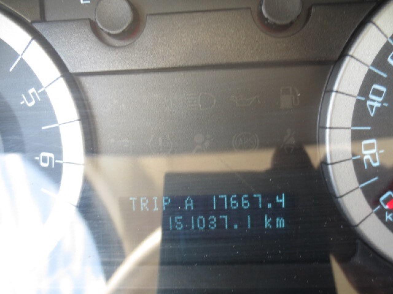 12595837