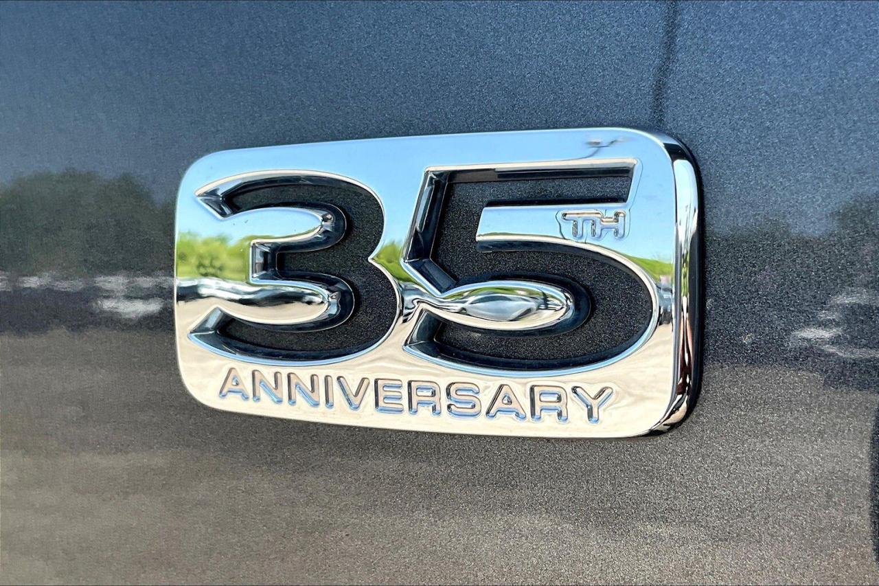 12595969