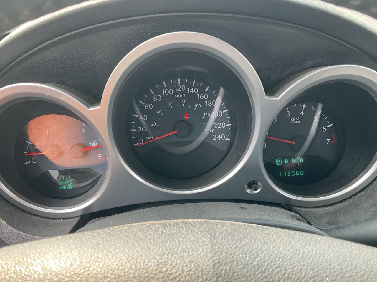12595981