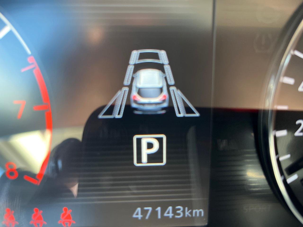 12596023