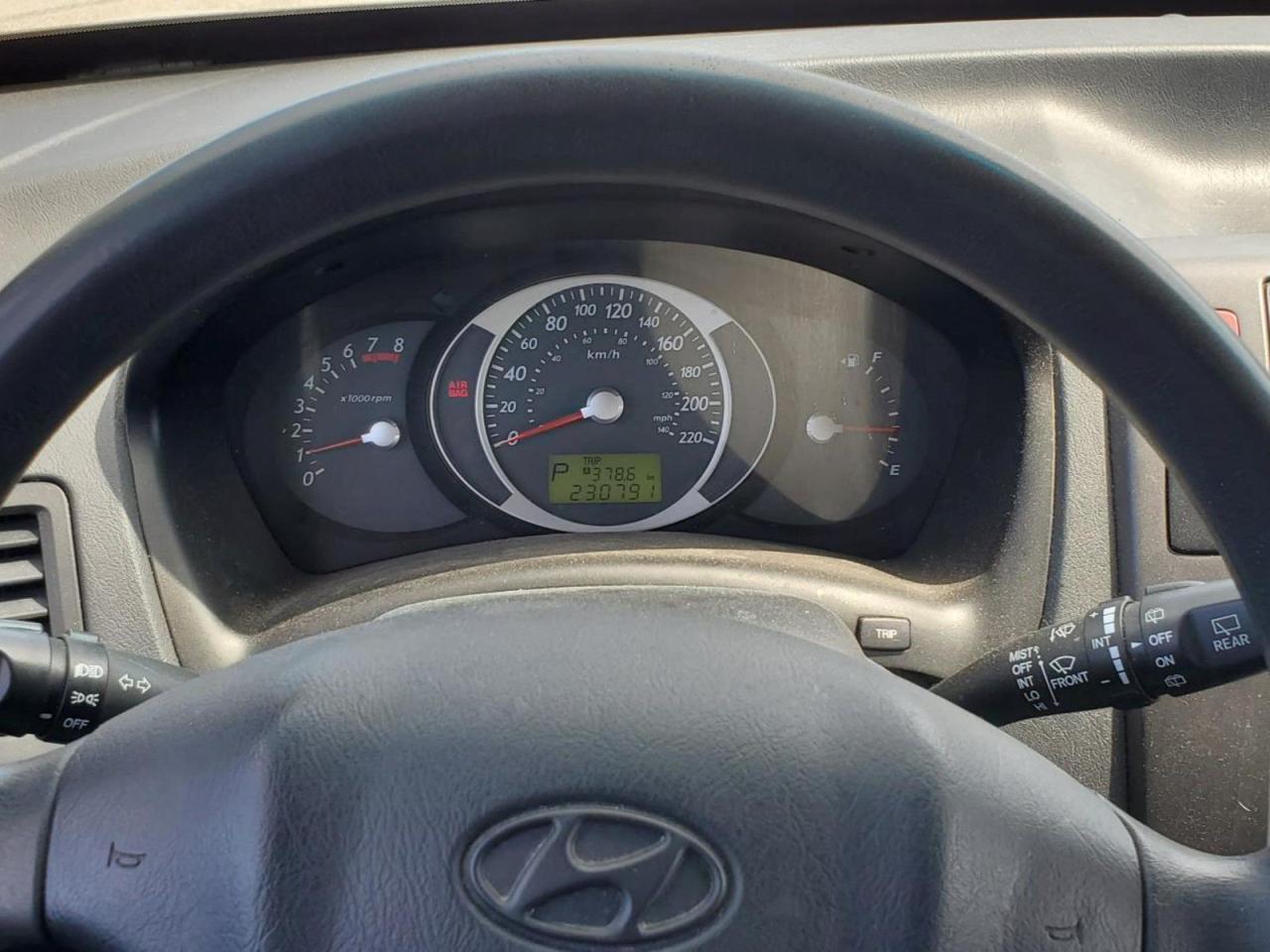 12596740
