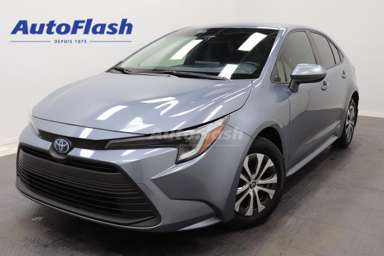 Used 2024 Toyota Corolla HYBRID LE, CAMERA, CARPLAY, SIEGES + VOLANT CHAUFF for sale in Saint-Hubert, QC