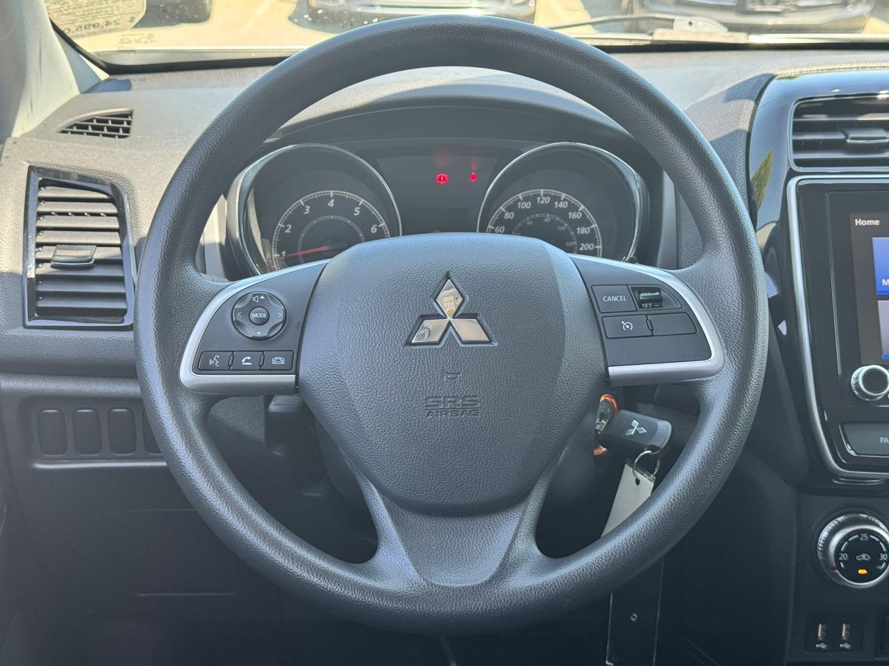 12600571