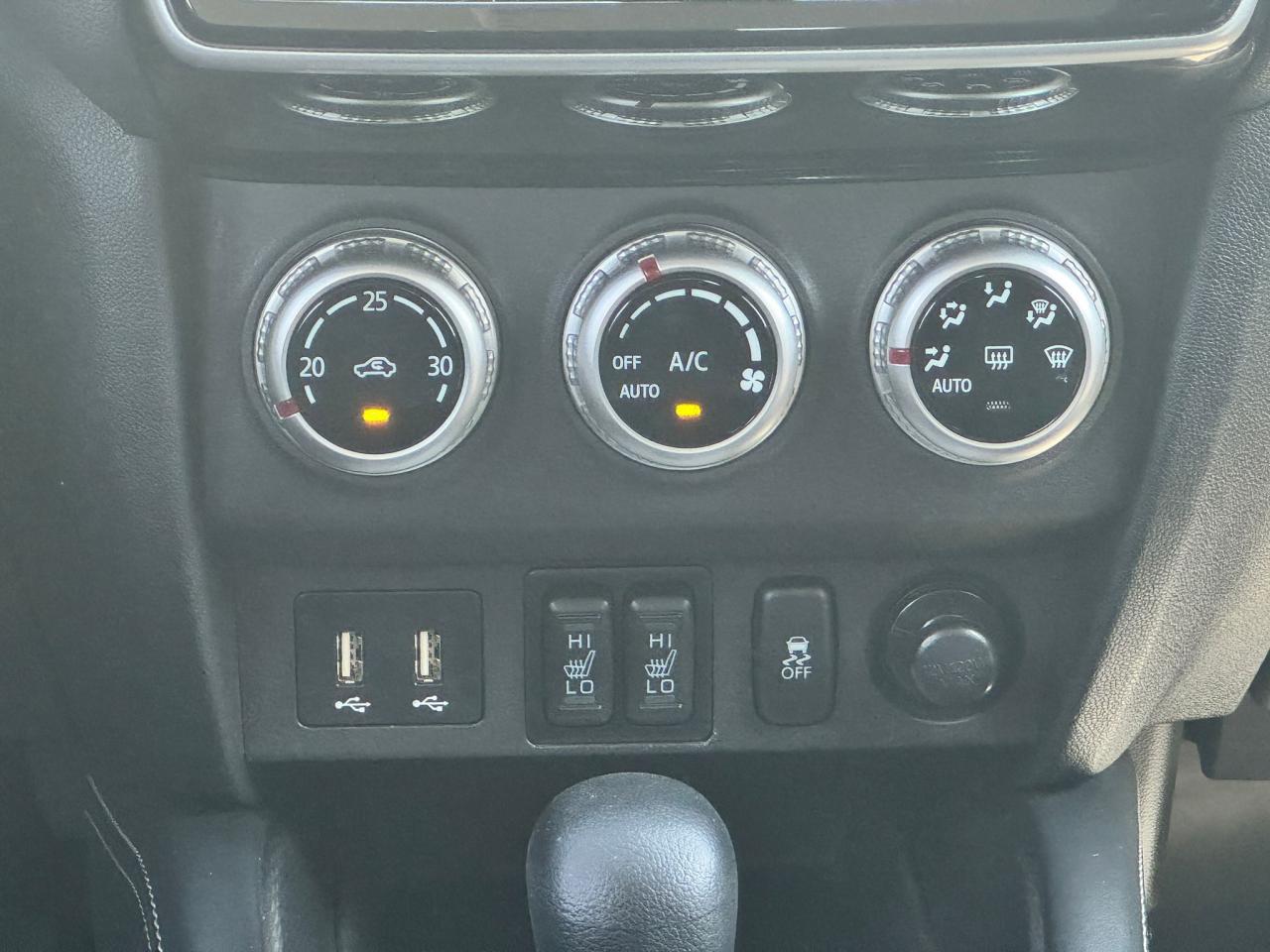 12600571