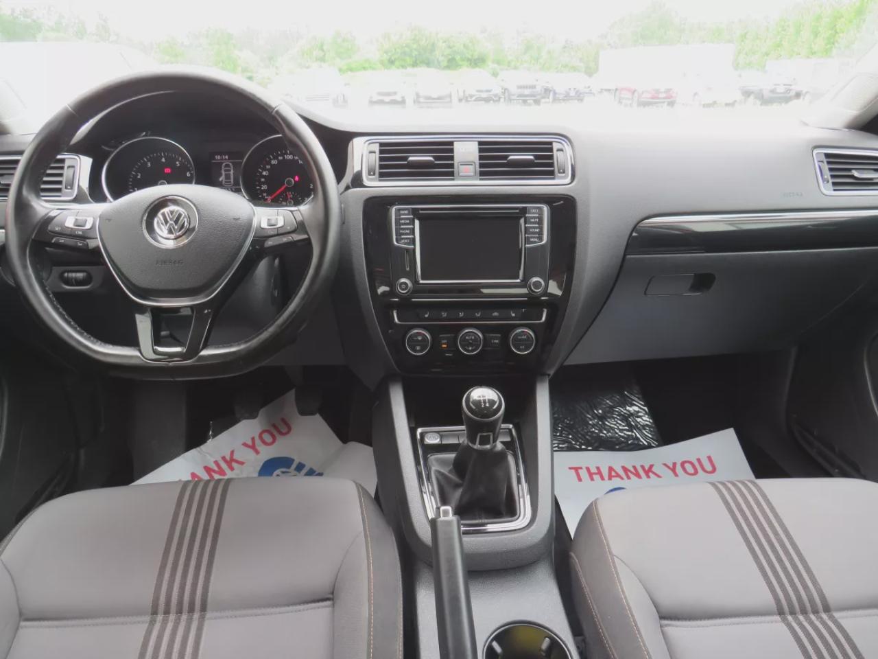 2017 Volkswagen Jetta Sedan Wolfsburg Edition (**LOW KM!!**CLEAN TITLE/NO ACCIDENTS!!**SAFETY/CERTIFIED!!**MANUAL TRANSMISSION**SUNROOF**ALLOY RIMS**HEATED SEATS**POWER SEATS**LEATHER WRAPPED STEERING WHEEL**DIGITAL TOUCHSCREEN**REVERSE CAMERA**DUAL CLIMATE CONTROL**PUSH BUTTO Photo4