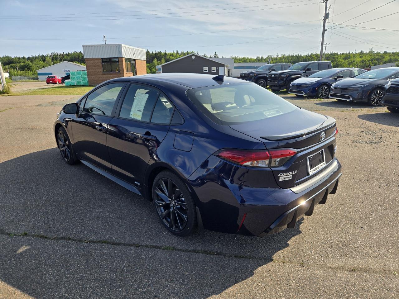 2025 Toyota Corolla COROLLA HYBRID XSE AWD Photo2