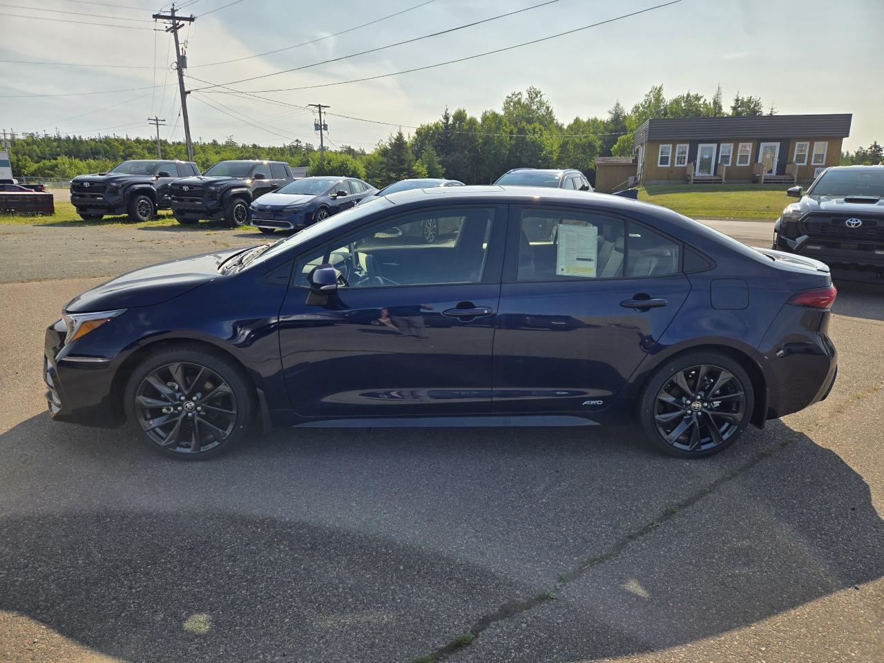 2025 Toyota Corolla COROLLA HYBRID XSE AWD Photo1