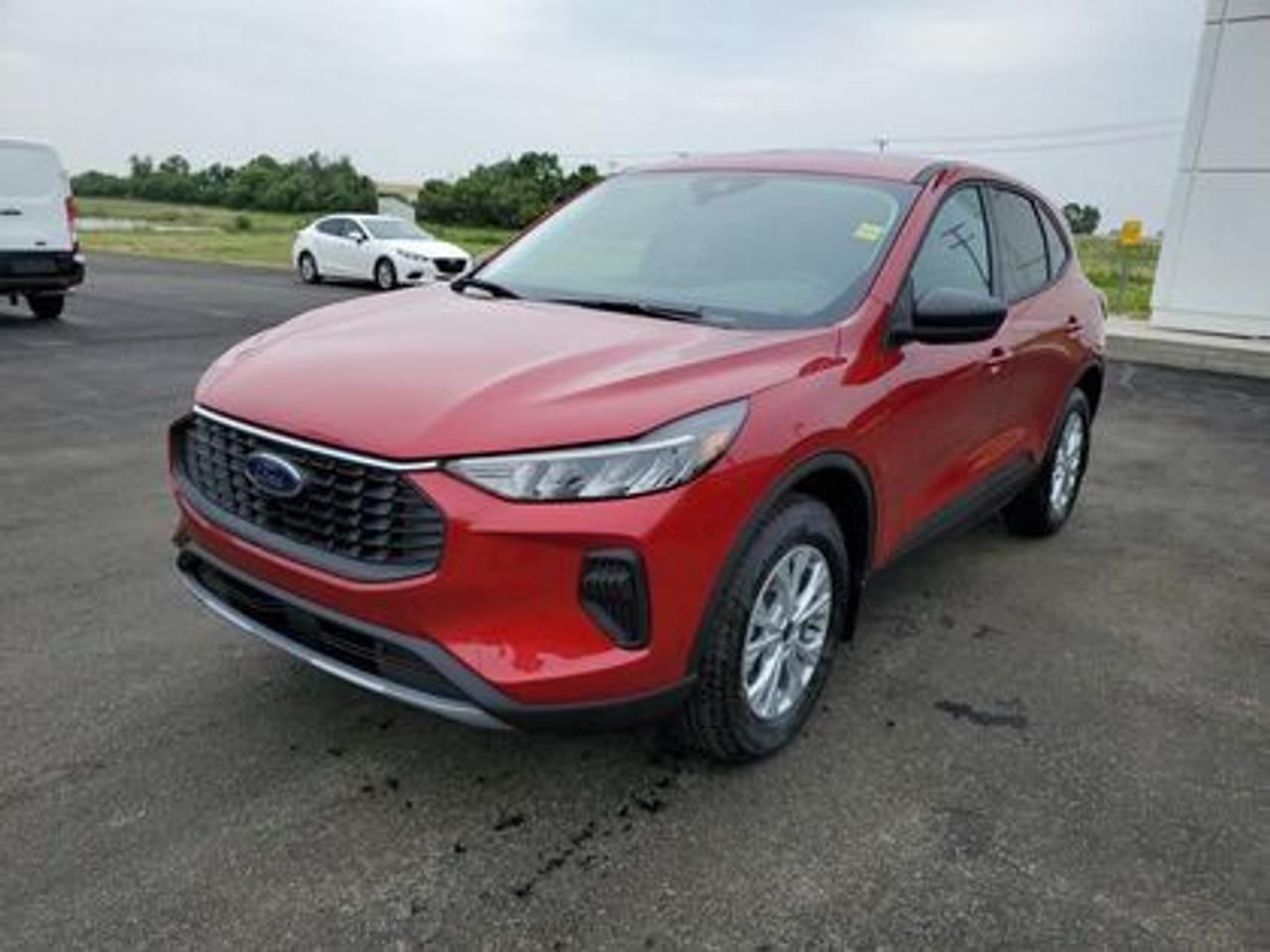 This all-new 2025 Escape Active 200A looks absolutely stunning in Rapid Red Metallic. This 5-passenger All-wheel drive crossover comes equipped with the 1.5L EcoBoost® engine. This remarkable engine not only produces 181 horsepower and 190 ft-lbs of torque, but by leveraging EcoBoost® technology and an 8-speed automatic transmission, this crossover is rated to get an estimated 8.4L/100km (34 miles per gallon) combined highway/city fuel economy.

Key Features:
8 Instrument panel cluster
 All-wheel drive
Ford Co-Pilot360
Heated Front Seats
Remote Start
Heated Mirrors
SYNC® 4 W/8 LCD Capacitive Touchscreen
Wireless Apple CarPlay® and Android Auto Compatibility
Privacy Glass
17 Shadow Silver Painted Aluminum Wheels
Power Windows
LED Taillamps
LED Headlamps
FordPass Connect
Mini Spare Wheel/Tire

Moose Jaw Ford, conveniently located at 1010 North Service Road in Moose Jaw, is your trusted destination for all your automotive needs. With an impressive 4.8-star Google rating from nearly 1,500 reviews, we are proud to deliver an exceptional vehicle-buying experience tailored just for you. Our Moose Jaw Motives set us apart, offering unbeatable value like half-priced oil changes for life on pre-owned vehicles, one year of key and remote protection, and one year of tire and rim protection. Enjoy peace of mind with every purchase. At Moose Jaw Ford, were committed to driving positive change in our community by combining exceptional service, high-quality vehicles, and a guest-first approach. Visit us today!
