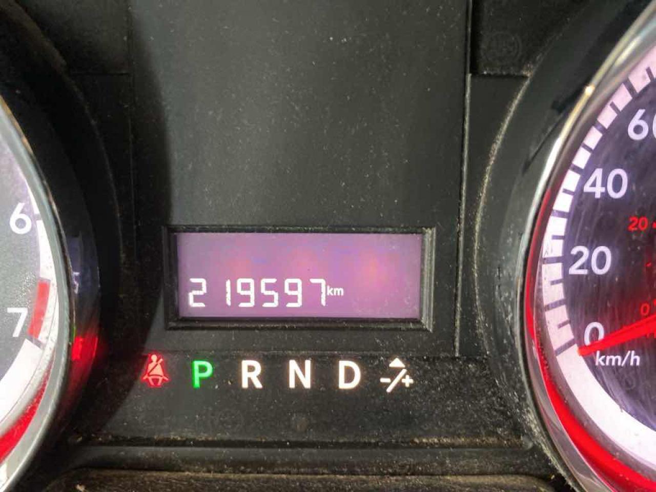 12603595