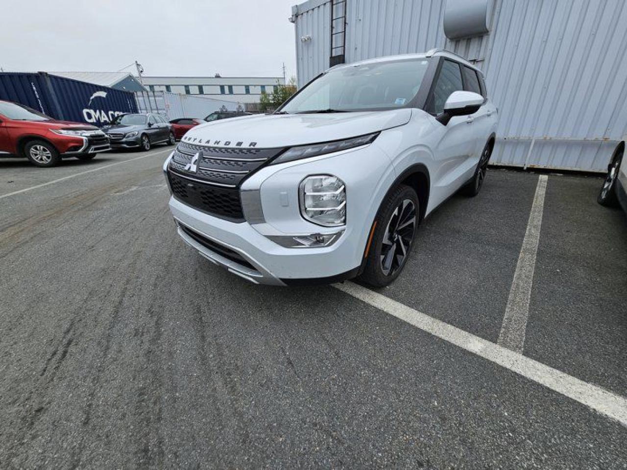NEW ARRIVAL JUST IN TIME FOR SUMMER ROAD TRIPS!2023 Mitsubishi Outlander LE 4WD, 4-Wheel Disc Brakes, 6 Speakers, Air Conditioning, Alloy wheels, AM/FM radio: SiriusXM, Auto High-beam Headlights, Automatic temperature control, Bumpers: body-colour, Driver door bin, Driver vanity mirror, Dual front side impact airbags, Emergency communication system: Mitsubishi Connect w/ 24-month trial, Exterior Parking Camera Rear, Front reading lights, Fully automatic headlights, Headlight cleaning, Heated door mirrors, Heated Front Bucket Seats, Illuminated entry, Knee airbag, Leather steering wheel, Low tire pressure warning, Overhead airbag, Overhead console, Panic alarm, Passenger vanity mirror, Power Liftgate, Power moonroof, Power windows, Radio: 9 Smartphone Link Display Audio, Rear Parking Sensors, Rear side impact airbag, Rear window defroster, Rear window wiper, Security system, Split folding rear seat, Steering wheel mounted audio controls, Tilt steering wheel, Trip computer, Turn signal indicator mirrors, Variably intermittent wipers.White Diamond 2023 Mitsubishi Outlander LE 4WD CVT 2.5L 4-Cylinder DOHCSteele Mitsubishi has the largest and most diverse selection of preowned vehicles in HRM. Buy with confidence, knowing we use fair market pricing guaranteeing the absolute best value in all of our pre owned inventory!Steele Auto Group is one of the most diversified group of automobile dealerships in Canada, with 60 dealerships selling 29 brands and an employee base of well over 2300. Sales are up over last year and our plan going forward is to expand further into Atlantic Canada and the United States furthering our commitment to our Canadian customers as well as welcoming our new customers in the USA.