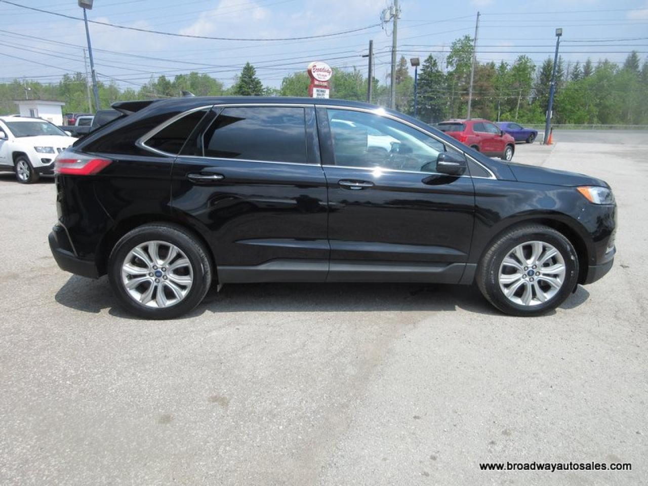 2021 Ford Edge ALL-WHEEL DRIVE TITANIUM-MODEL 5 PASSENGER 2.0L - DOHC.. NAVIGATION.. PANORAMIC SUNROOF.. LEATHER.. HEATED/AC SEATS.. POWER TAILGATE.. Photo