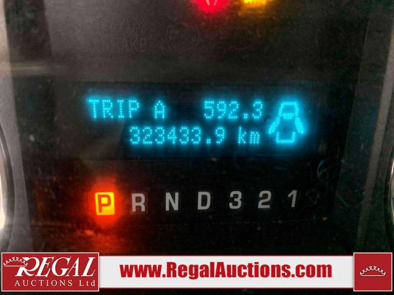 12609877