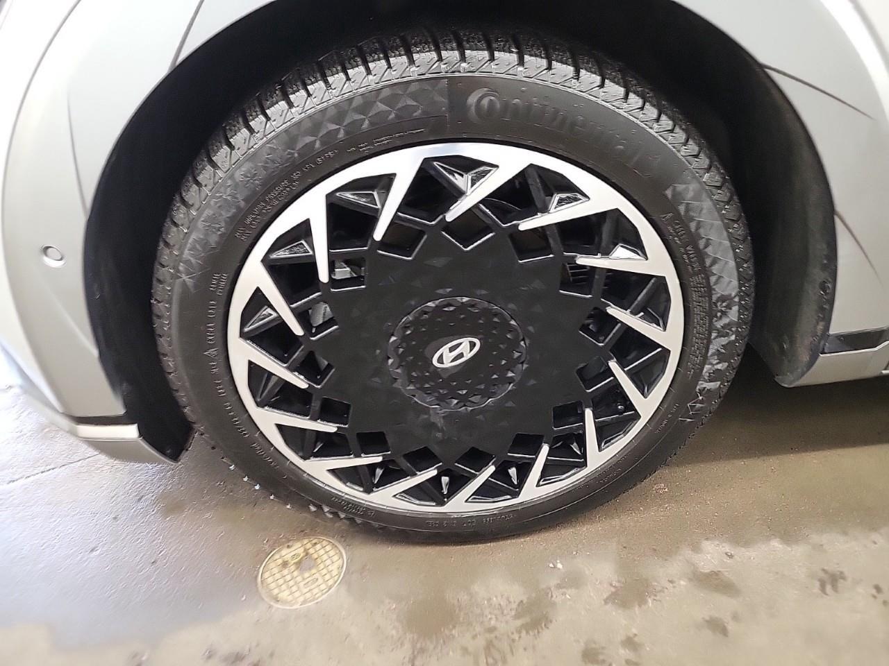 12610825