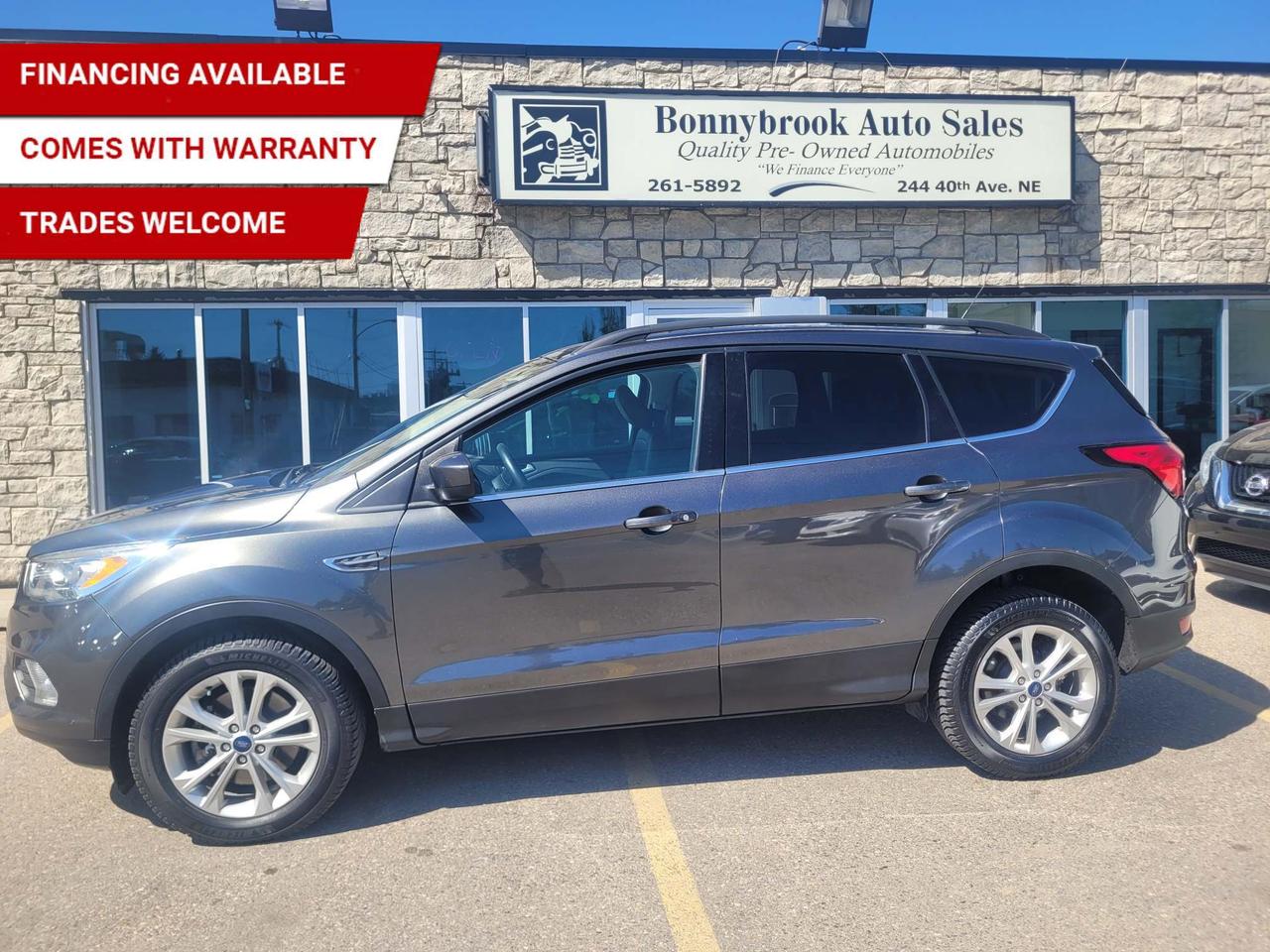 Need a vehicle that has style? Look at our Pre-Owned 2019 FORD ESCAPE SEL 4X4  (Pictured in photo) Filled with top options including Heated Leather Seats, Keyless Entry, Bluetooth, Navigation, Remote car starter, Adaptive cruise control, Power Mirrors, Power Locks, Power Windows. Power seat. Am/Fm stereo Cd player, Rearview camera  Power Lift Gate/Air /Tilt /Cruise/ comes with 6 month power train warranty with options to extend. Smooth ride at a great price thats ready for your test drive. Fully inspected and given a clean bill of health by our technicians. Fully detailed on the interior and exterior so it feels like new to you. There should never be any surprises when buying a used car, thats why we share our Mechanical Fitness Assessment and Carfax with our customers, so you know what we know. Bonnybrook Auto sales is helping thousands find quality used vehicles at prices they can afford. If you would like to book a test drive, have questions about a vehicle or need information on finance rates, give our friendly staff a call today! Bonnybrook auto sales is proudly one of the few car dealerships that have been serving Calgary for over Twenty years. /TRADE INS WELCOMED/ Amvic Licensed Business.  Due to the recent increase for used vehicles.  We are in need of pre-owned vehicles. We give top dollar for your trades.  We also purchase all makes and models of vehicles.