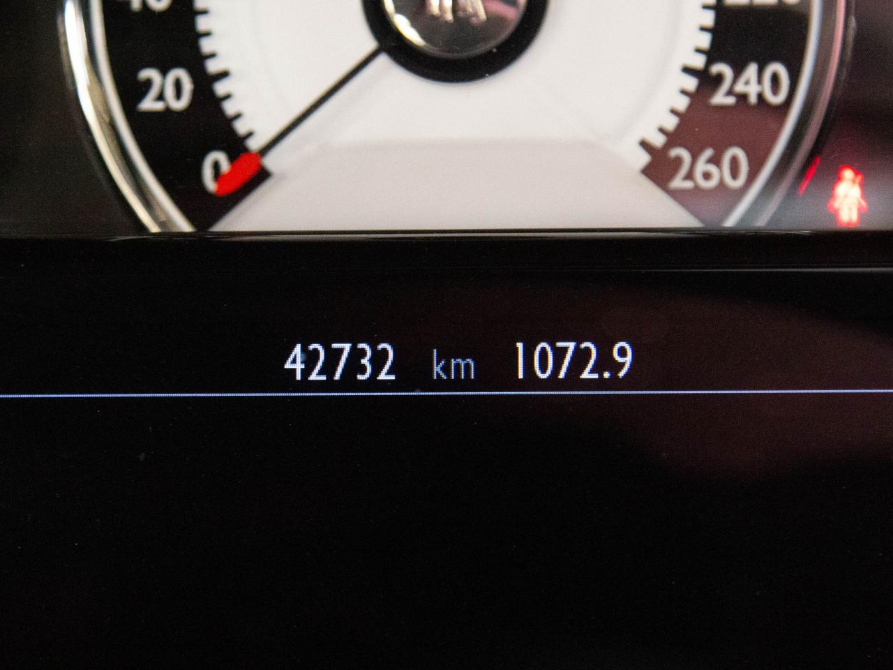 12611185