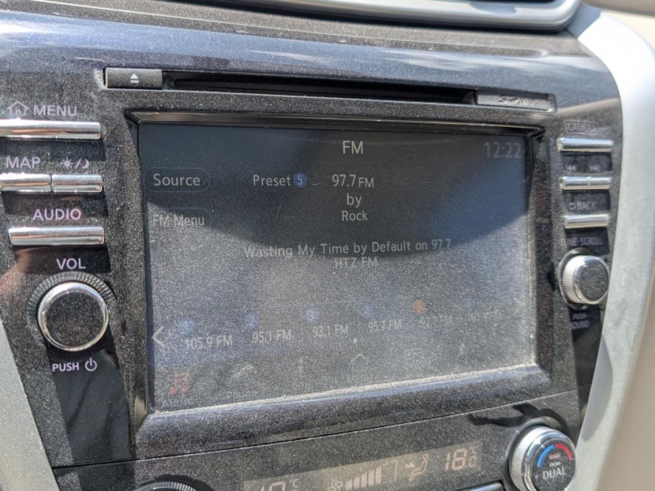 12611566