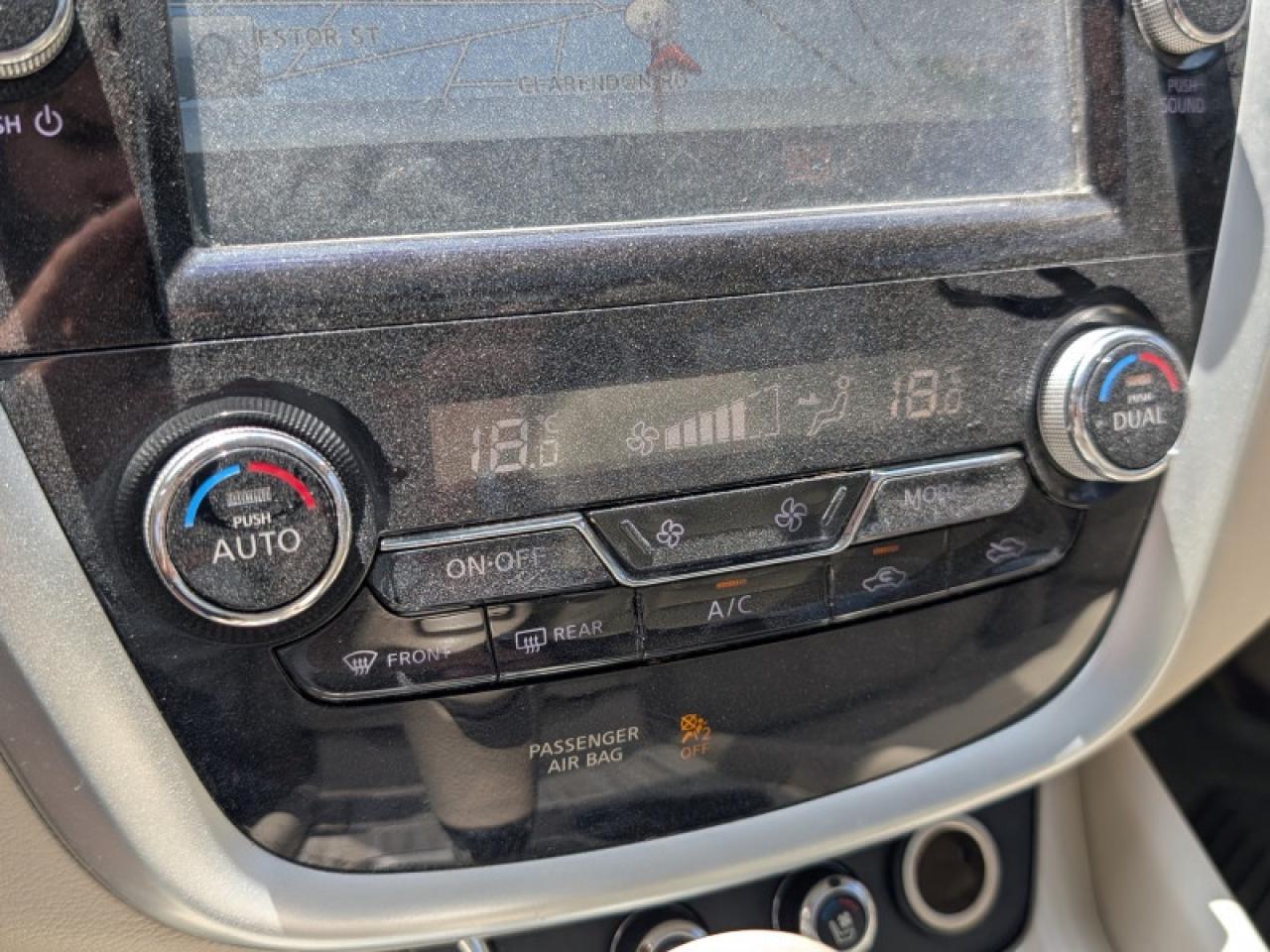 12611566