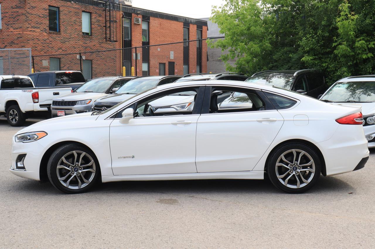 2019 Ford Fusion Hybrid Titanium | Leather | Roof | Nav | Cam | Alloys ++ Photo6