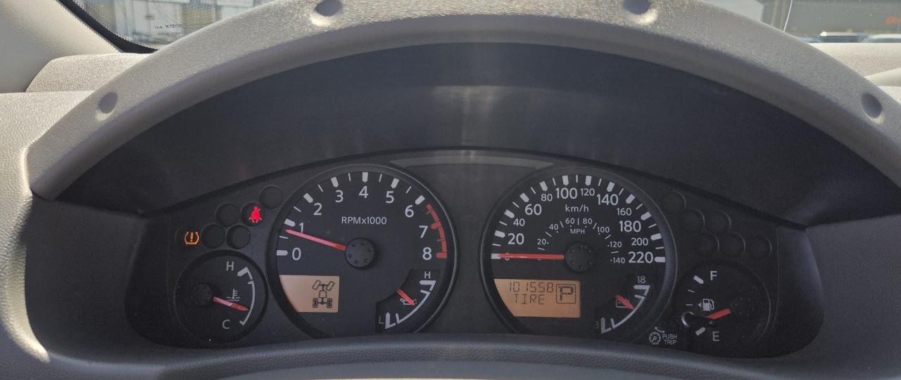 12615718