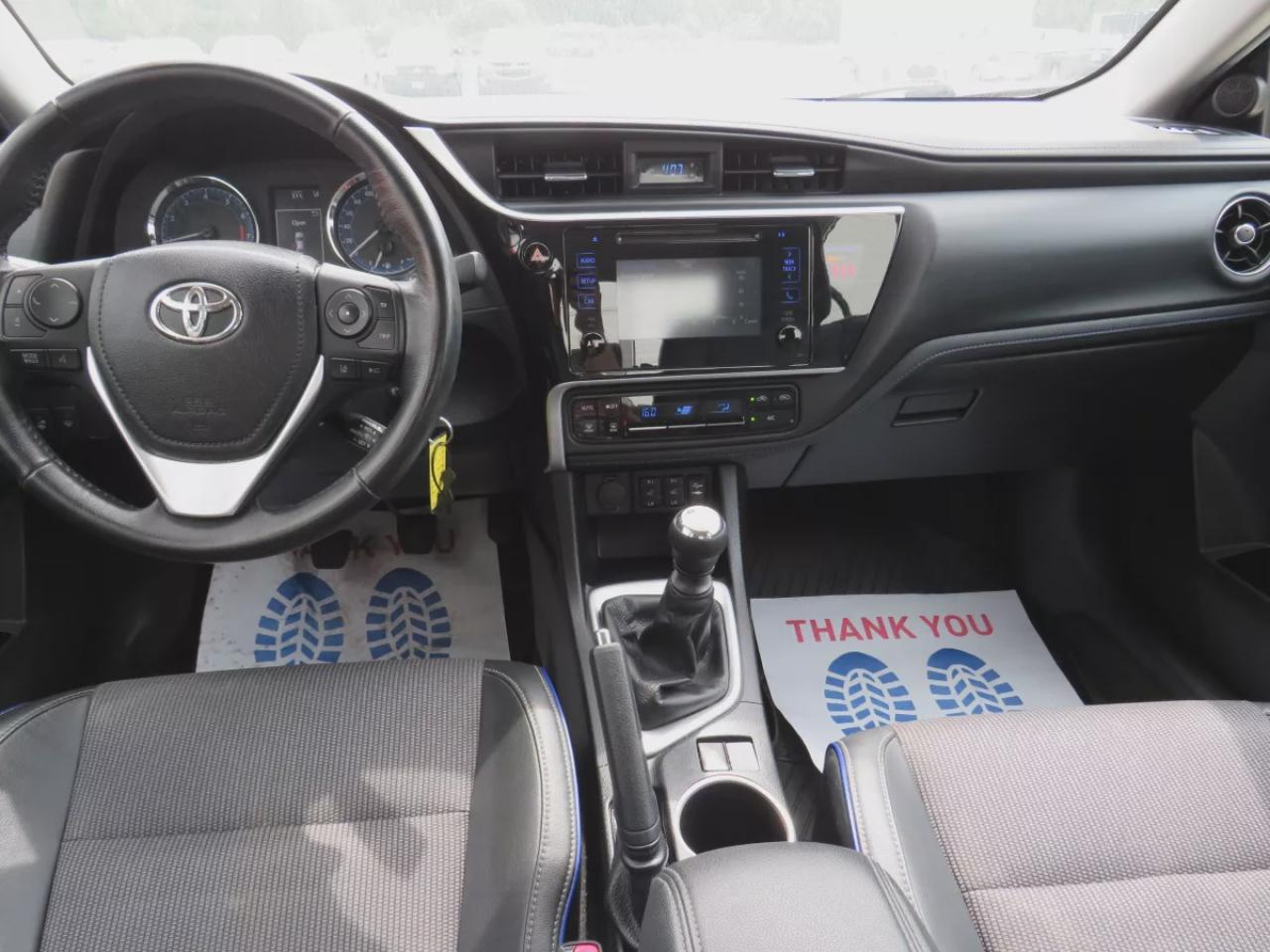 2019 Toyota Corolla SE (**ONE OWNER!!**CLEAN TITLE/NO ACCIDENTS!!**SAFETY/CERTIFIED!!**MANUAL TRANSMISSION**SUNROOF**REVERSE CAMERA**LEATHER WRAPPED STEERING WHEEL**HEATED SEATS/STEERING WHEEL**DIGITAL TOUCHSCREEN**CUSTOM COROLLS RUBBER MATS**BLUETOOTH**CRUISE CONTROL**) Photo