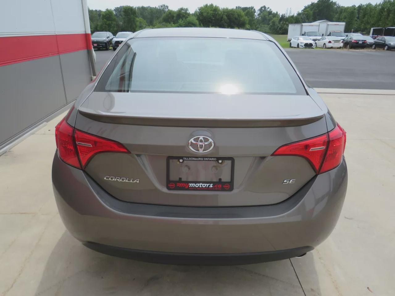 2019 Toyota Corolla SE  | One Owner | Clean Title | No Accidents | Safety Certified | Manual Transmission | Sunroof | Reverse Camera | Leather Wrapped Steering Wheel | Heated Seats | Heated Steering Wheel | Digital Touchscreen | Custom Corolla Rubber Mats | Bluetooth Photo