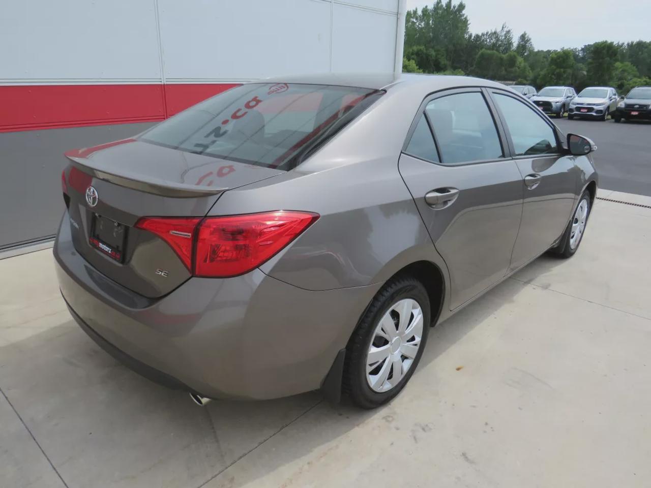 2019 Toyota Corolla SE  | One Owner | Clean Title | No Accidents | Safety Certified | Manual Transmission | Sunroof | Reverse Camera | Leather Wrapped Steering Wheel | Heated Seats | Heated Steering Wheel | Digital Touchscreen | Custom Corolla Rubber Mats | Bluetooth Photo