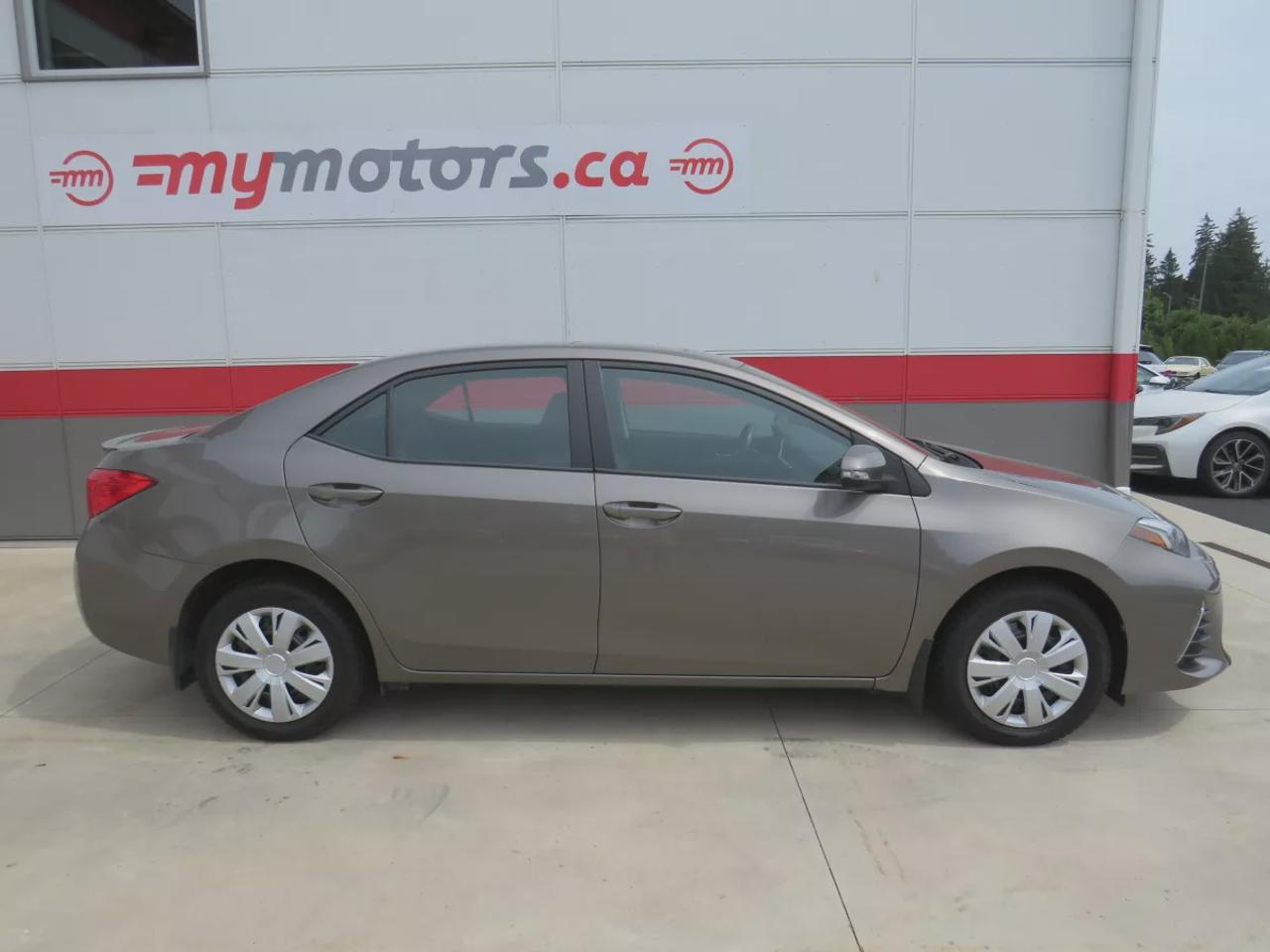 2019 Toyota Corolla SE  | One Owner | Clean Title | No Accidents | Safety Certified | Manual Transmission | Sunroof | Reverse Camera | Leather Wrapped Steering Wheel | Heated Seats | Heated Steering Wheel | Digital Touchscreen | Custom Corolla Rubber Mats | Bluetooth Photo