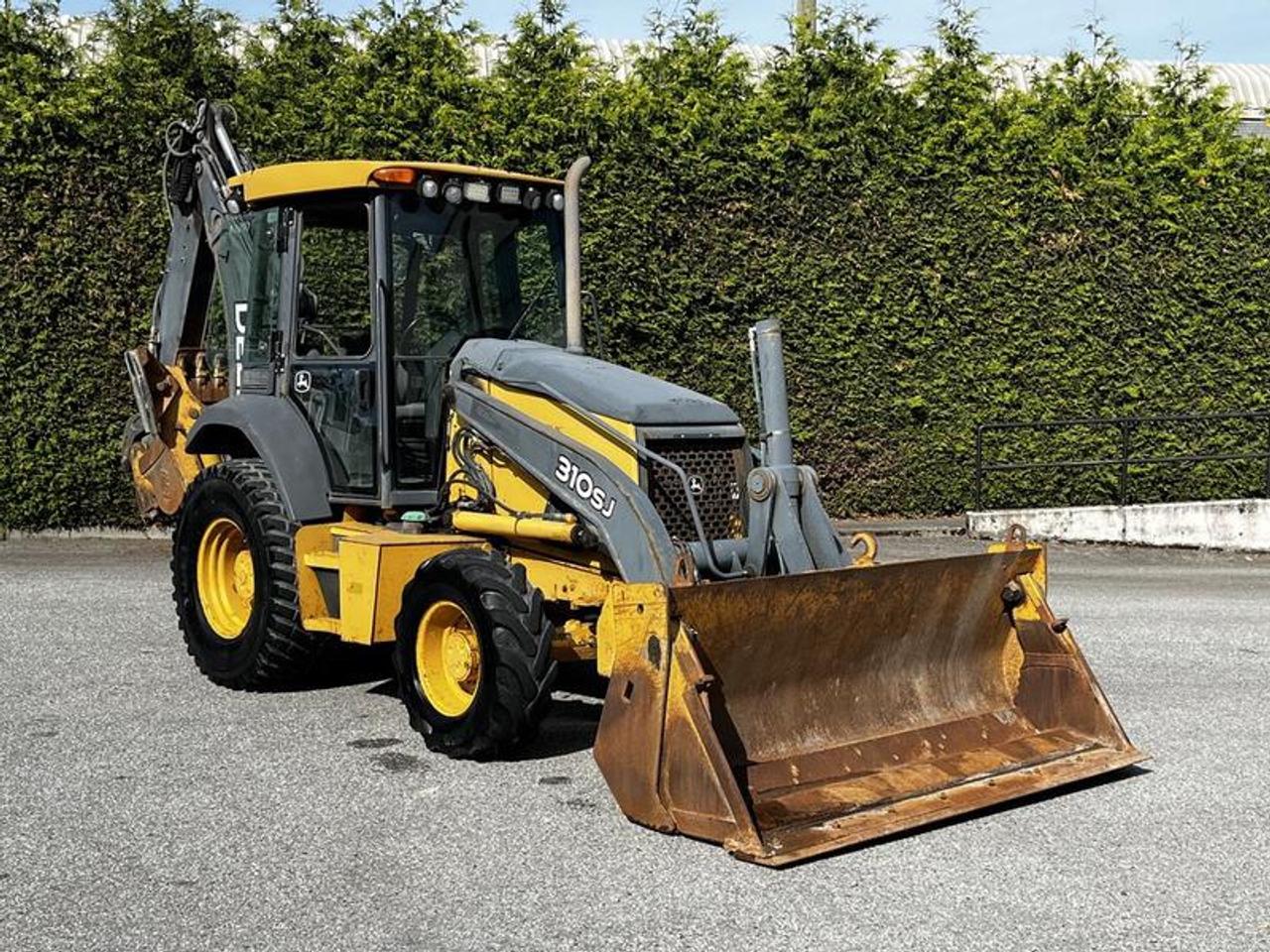 This 2010 John Deere 310SJ Backhoe Loader is powered by a 4.5L 4-cylinder diesel engine paired with an automatic transmission and four-wheel drive. Designed for excavation, loading, trenching, material handling, and general construction applications, this machine combines a front loader and rear backhoe in a versatile equipment platform.

The front loader is equipped with a 92-inch 4-in-1 bucket with an approximate 1.01 cubic yard capacity and a lift capacity of approximately 7,425 lbs at full height. The rear features an extendable backhoe, providing an approximate maximum digging depth of 14.5 feet, reach from swivel of 18.25 feet, and an extended loading height of approximately 14.08 feet. Additional loader specifications include a maximum dump clearance of approximately 8.83 feet, reach at maximum dump height of approximately 2.58 feet, and a dig depth of approximately 6.3 inches.

Finished in yellow with a black vinyl interior, this John Deere 310SJ provides a versatile backhoe loader platform suited for construction, utility, agricultural, and municipal applications. This item is currently OFFSITE. You must register an appointment with our office to schedule an offsite viewing. Appointments must be made a minimum of one business day in advance (and as defined by the days that Repo.com is open for business) before your appointment can be scheduled and confirmed. We may, at our own discretion, instead opt to transport smaller items to Repo.coms main yard for viewing purposes.  $53,880.00 plus $375 processing fee, $54,255.00 total payment obligation before taxes.   Listing report, warranty, contract commitment cancellation fee, financing available on approved credit (some limitations and exceptions may apply). All above specifications and information is considered to be accurate but is not guaranteed and no opinion or advice is given as to whether this item should be purchased. We do not allow test drives due to theft, fraud, acts of vandalism and undetectable impaired driving. Instead we provide the following benefits: Complimentary Warranty (with options to extend), Limited Money Back Satisfaction Guarantee on Fully Completed Contracts, Contract Commitment Cancellation, and an Open-Ended Sell-Back Option. Ask seller for details or call 604-522-REPO(7376) to confirm listing availability.