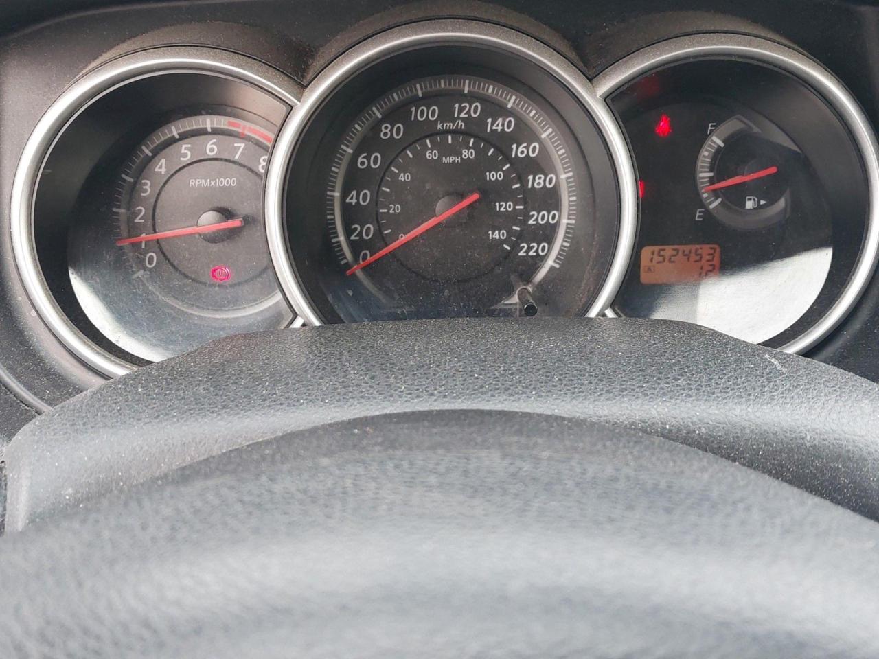 12617571