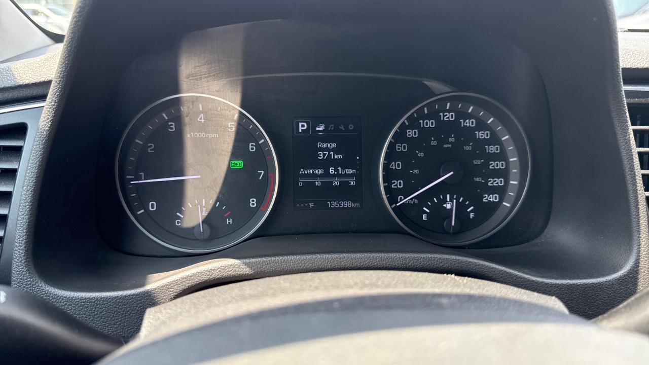 12618693