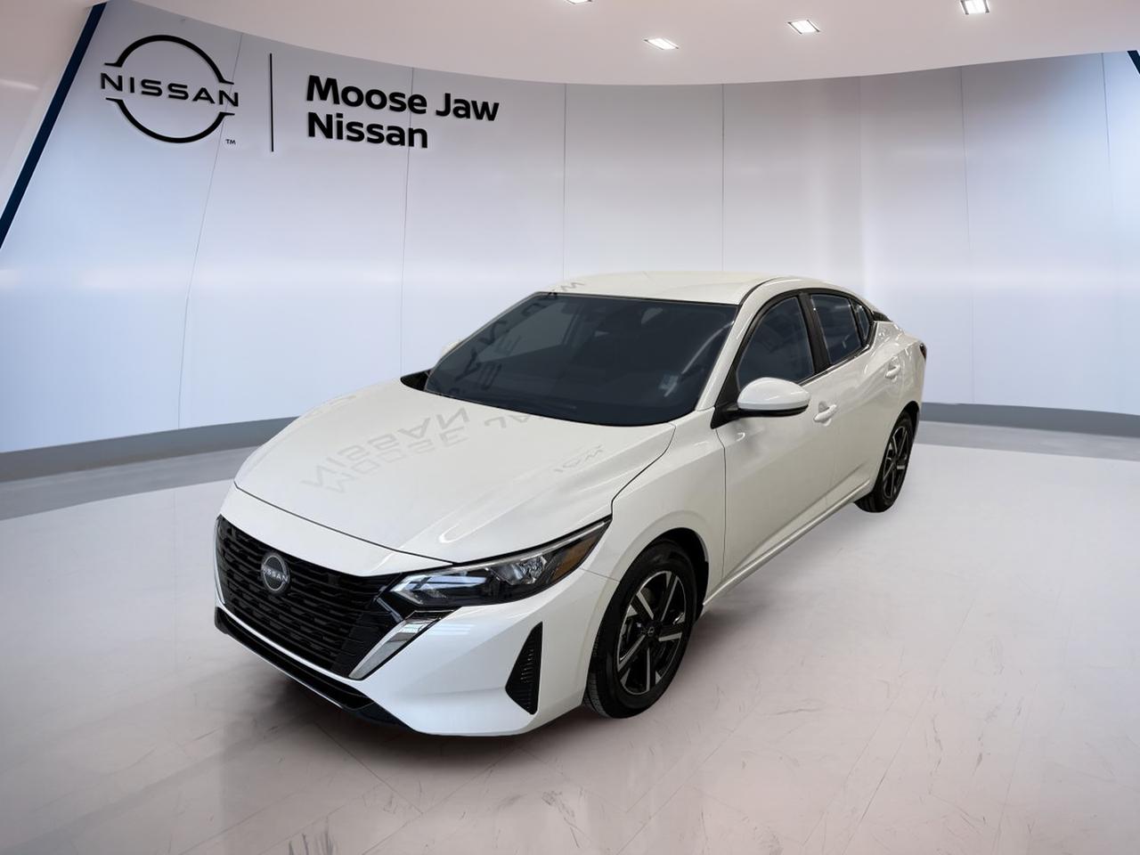 Experience the perfect blend of style, efficiency, and innovation with the brand new 2025 Nissan Sentra SV, now available at Moose Jaw Nissan in Moose Jaw. This sedan stands out with its crisp white exterior and sleek black interior, offering a modern design that?s both practical and eye-catching. With advanced engineering and thoughtful features, the Sentra SV is an ideal choice for drivers seeking reliability and comfort in their daily commute.

FEATURES OF THE Sentra SV  
»» White exterior paired with black interior  
»» Xtronic Continuously Variable Transmission for smooth driving  
»» Front-wheel drive for confident handling  
»» 2.0L DOHC 16V 4-cylinder engine with idle stop/start  

ADVANCED SAFETY FEATURES  
»» Comprehensive airbag system for all-around protection  
»» Anti-lock braking system for controlled stops  
»» Vehicle dynamic control for enhanced stability  
»» Traction control system for improved grip  

PERFORMANCE AND EFFICIENCY  
»» 2.0L DOHC 16V 4-cylinder engine  
»» Idle stop/start system for fuel savings  
»» Xtronic CVT for seamless acceleration  
»» Front-wheel drive for responsive handling  

COMFORT AND CONVENIENCE  
»» Spacious seating for five passengers  
»» Automatic climate control for year-round comfort  
»» Keyless entry for easy access  
»» Ample legroom in both front and rear seats  

TECHNOLOGY AND CONNECTIVITY  
»» Touchscreen infotainment system  
»» Bluetooth hands-free calling and audio streaming  
»» USB ports for device charging  
»» Steering wheel-mounted audio controls  

CARGO SPACE  
»» Generous trunk space for everyday needs  
»» Split-folding rear seats for flexible storage  
»» Wide trunk opening for easy loading  
»» Convenient interior storage compartments  

WHAT OTHER OWNERS LIKE  
»» Smooth and quiet ride quality  
»» User-friendly infotainment system  
»» Excellent fuel efficiency  
»» Comfortable and spacious cabin  

This 2025 Nissan Sentra SVs VIN is: 3N1AB8CV0SY334335.