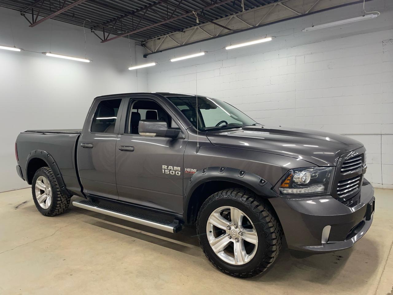 Used 2014 RAM 1500 4WD QUAD CAB 140.5